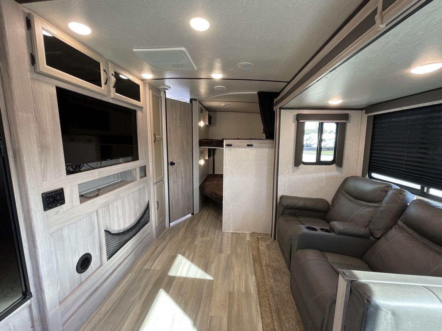 2021 COACHMEN SPIRIT 2963BH (5ZT2SBVBXMS) , Length: 33.92 ft. | Dry Weight: 6,408 lbs. | Slides: 1 transmission, located at 4319 N Main St, Cleburne, TX, 76033, (817) 678-5133, 32.385960, -97.391212 - The 2021 Coachmen Spirit 2963BH is a family-friendly travel trailer designed to maximize comfort and convenience while camping. With its spacious bunkhouse, open layout, and thoughtful features, this model is ideal for families or groups seeking a comfortable and easy-to-tow trailer for extended cam - Photo#10