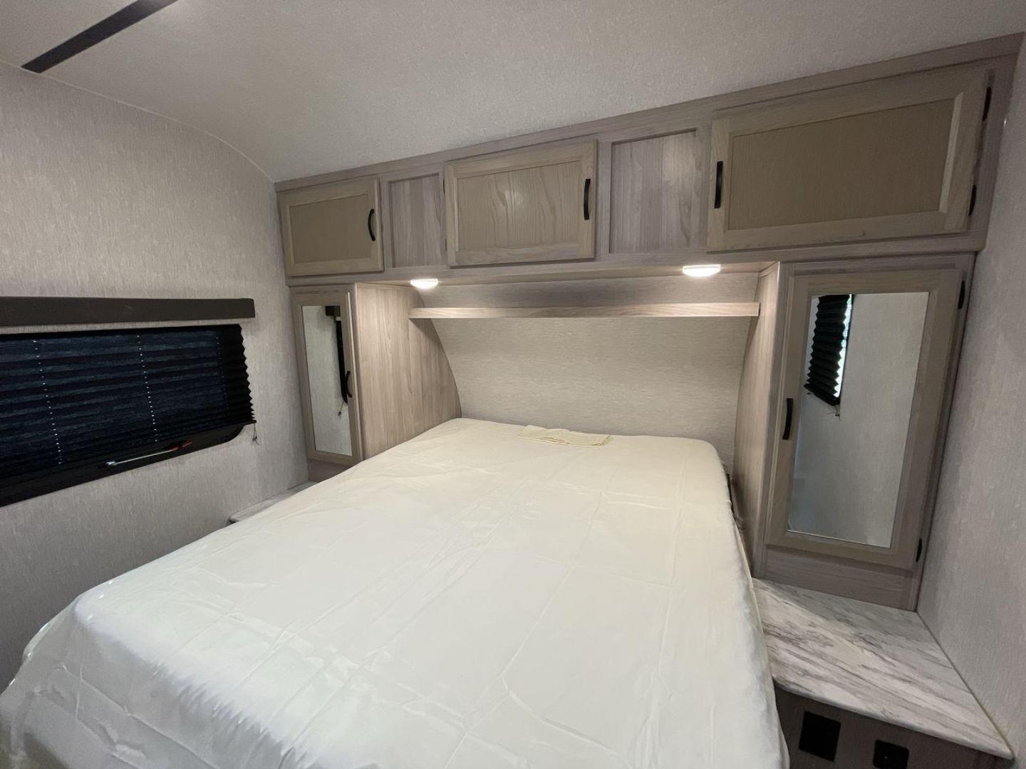 2021 COACHMEN SPIRIT 2963BH (5ZT2SBVBXMS) , Length: 33.92 ft. | Dry Weight: 6,408 lbs. | Slides: 1 transmission, located at 4319 N Main St, Cleburne, TX, 76033, (817) 678-5133, 32.385960, -97.391212 - The 2021 Coachmen Spirit 2963BH is a family-friendly travel trailer designed to maximize comfort and convenience while camping. With its spacious bunkhouse, open layout, and thoughtful features, this model is ideal for families or groups seeking a comfortable and easy-to-tow trailer for extended cam - Photo#16