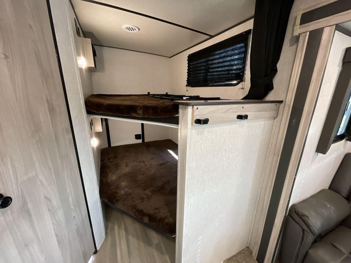 2021 COACHMEN SPIRIT 2963BH (5ZT2SBVBXMS) , Length: 33.92 ft. | Dry Weight: 6,408 lbs. | Slides: 1 transmission, located at 4319 N Main St, Cleburne, TX, 76033, (817) 678-5133, 32.385960, -97.391212 - The 2021 Coachmen Spirit 2963BH is a family-friendly travel trailer designed to maximize comfort and convenience while camping. With its spacious bunkhouse, open layout, and thoughtful features, this model is ideal for families or groups seeking a comfortable and easy-to-tow trailer for extended cam - Photo#18