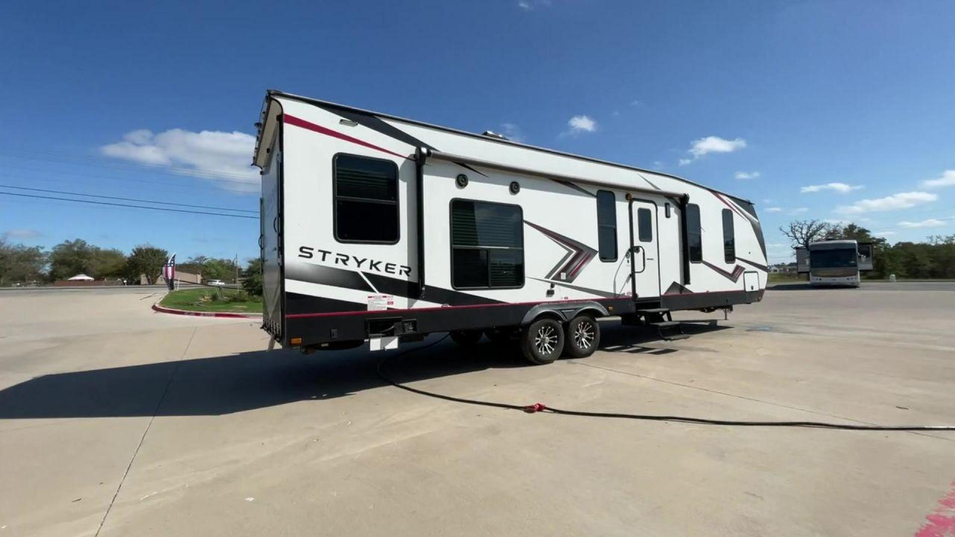 2021 CRUISER RV STRYKER 3414 (5RXGB392XM1) , Length: 38.75 ft. | Dry Weight: 9,608 lbs. | Gross Weight: 12,800 lbs. | Slides: 2 transmission, located at 4319 N Main St, Cleburne, TX, 76033, (817) 678-5133, 32.385960, -97.391212 - The 2021 Cruiser RV Stryker 3414 is a meticulously crafted toy hauler that seamlessly integrates luxury, versatility, and durability to provide an exceptional on-the-road experience. Whether you're a passionate thrill-seeker indulging in outdoor sports or a discerning family seeking comfort, the Str - Photo#1