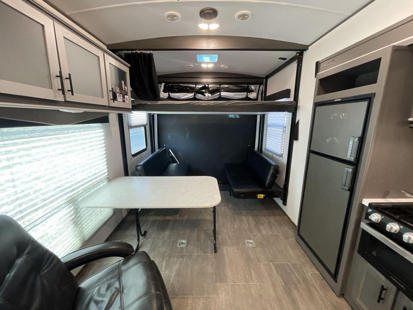 2021 CRUISER RV STRYKER 3414 (5RXGB392XM1) , Length: 38.75 ft. | Dry Weight: 9,608 lbs. | Gross Weight: 12,800 lbs. | Slides: 2 transmission, located at 4319 N Main St, Cleburne, TX, 76033, (817) 678-5133, 32.385960, -97.391212 - The 2021 Cruiser RV Stryker 3414 is a meticulously crafted toy hauler that seamlessly integrates luxury, versatility, and durability to provide an exceptional on-the-road experience. Whether you're a passionate thrill-seeker indulging in outdoor sports or a discerning family seeking comfort, the Str - Photo#12