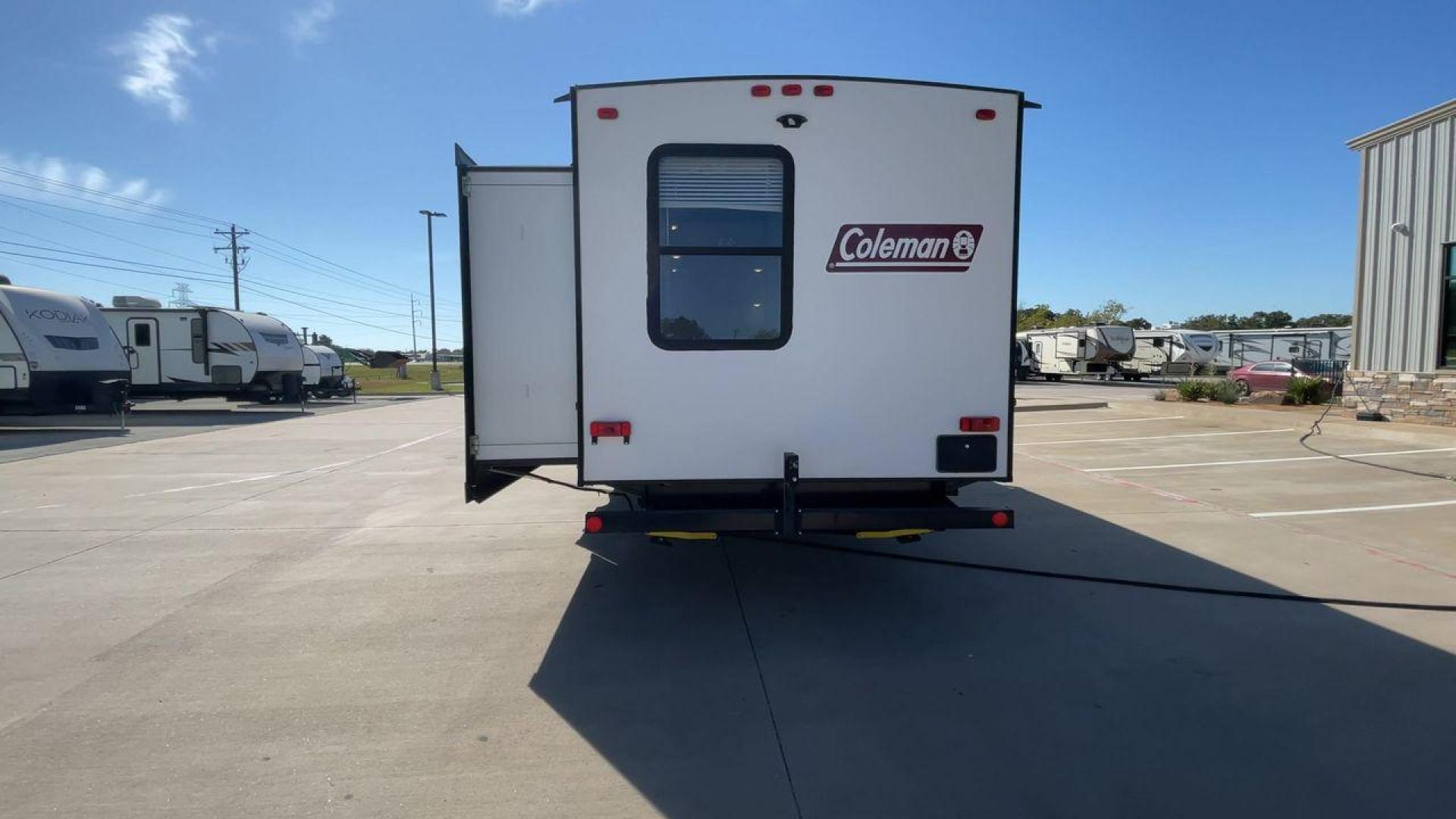 2021 DUTCHMEN COLEMAN 3215BH (4YDT32129MM) , Length: 36.92 ft. | Dry Weight: 7,718 lbs. | Slides: 2 transmission, located at 4319 N Main St, Cleburne, TX, 76033, (817) 678-5133, 32.385960, -97.391212 - The 2021 Dutchmen Coleman 3215BH is a spacious and family-friendly travel trailer designed to provide comfort and convenience on the road. With its rear bunkhouse, large living space, and outdoor kitchen, this model is ideal for families who want a versatile RV with plenty of room for everyone. The - Photo#8