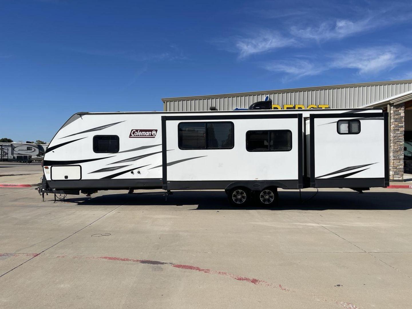 2021 DUTCHMEN COLEMAN 3215BH (4YDT32129MM) , Length: 36.92 ft. | Dry Weight: 7,718 lbs. | Slides: 2 transmission, located at 4319 N Main St, Cleburne, TX, 76033, (817) 678-5133, 32.385960, -97.391212 - The 2021 Dutchmen Coleman 3215BH is a spacious and family-friendly travel trailer designed to provide comfort and convenience on the road. With its rear bunkhouse, large living space, and outdoor kitchen, this model is ideal for families who want a versatile RV with plenty of room for everyone. The - Photo#24