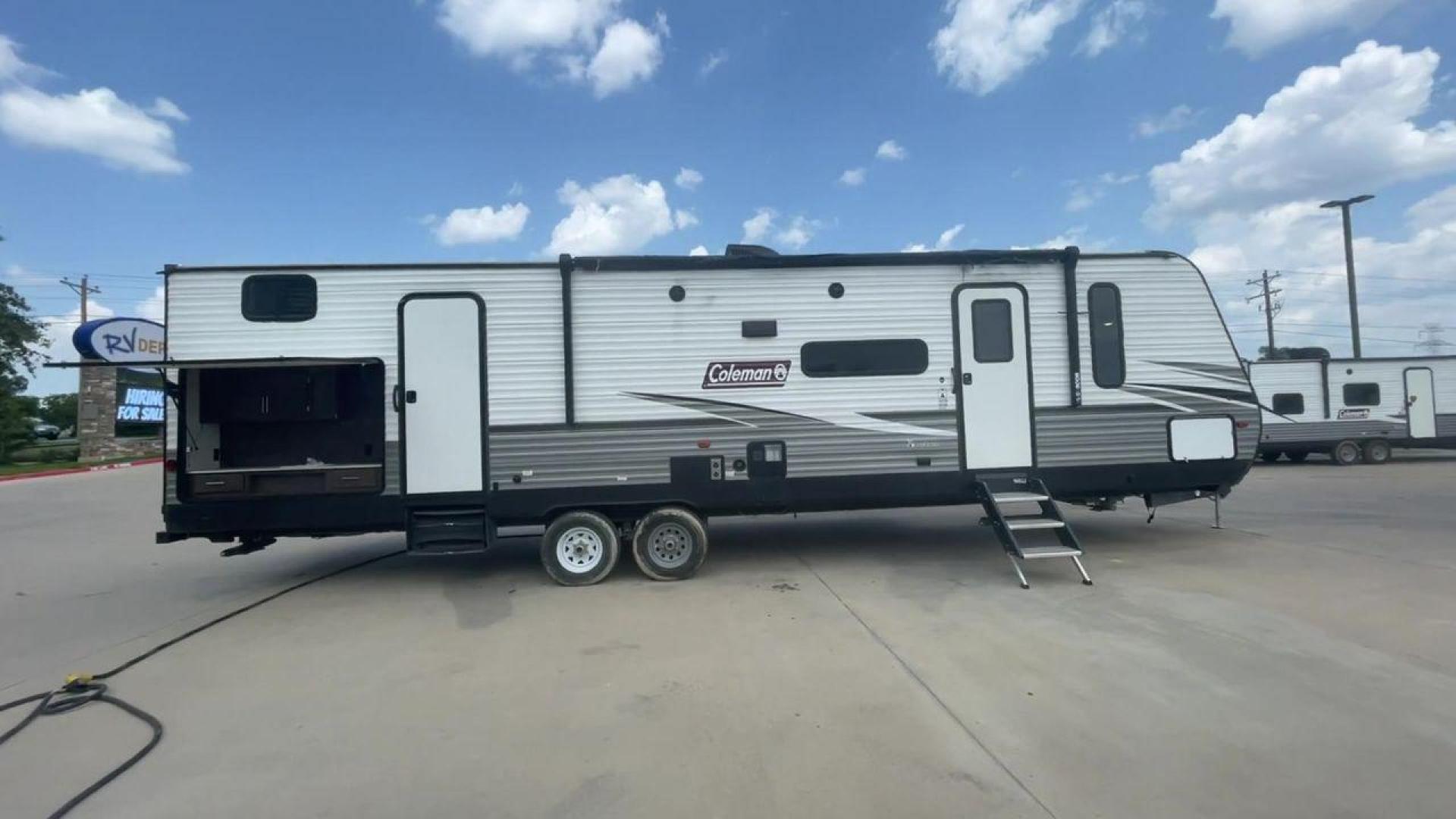 2021 WHITE DUTCHMEN COLEMAN 334BH (4YDT3342XMH) , Length: 37.25 ft. | Dry Weight: 7,806 lbs. | Slides: 2 transmission, located at 4319 N Main St, Cleburne, TX, 76033, (817) 678-5133, 32.385960, -97.391212 - The 2021 Dutchmen Coleman 334BH is a luxurious and spacious travel trailer designed to redefine your camping experience. Its exterior boasts a length of 37 feet, a width of 8 feet, and a dry weight of 7,806 lbs. The aluminum frame construction ensures durability and lightweight towing, while the hig - Photo#2