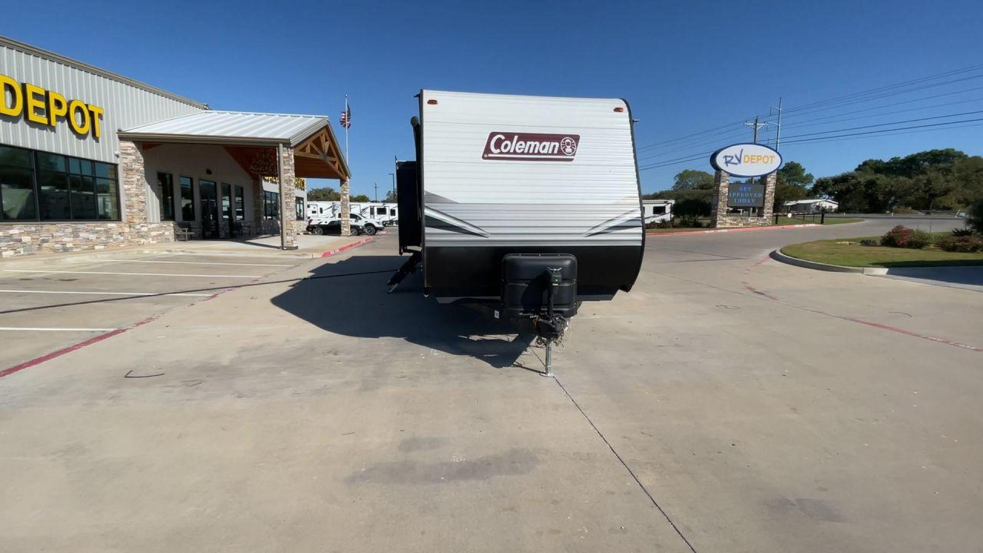 2021 DUTCHMEN COLEMAN 337BH (4YDT33723MH) , Length: 37.92 ft. | Dry Weight: 8,481 lbs. | Slides: 3 transmission, located at 4319 N Main St, Cleburne, TX, 76033, (817) 678-5133, 32.385960, -97.391212 - The 2021 Dutchmen Coleman 337BH, stretching 37.92 feet in length and weighing 8,481 lbs, showcases a sleek exterior designed for functionality and style. With its gray and black color scheme accented by the Coleman branding, this RV has a sturdy, aerodynamic front and a solid frame for durability. T - Photo#4