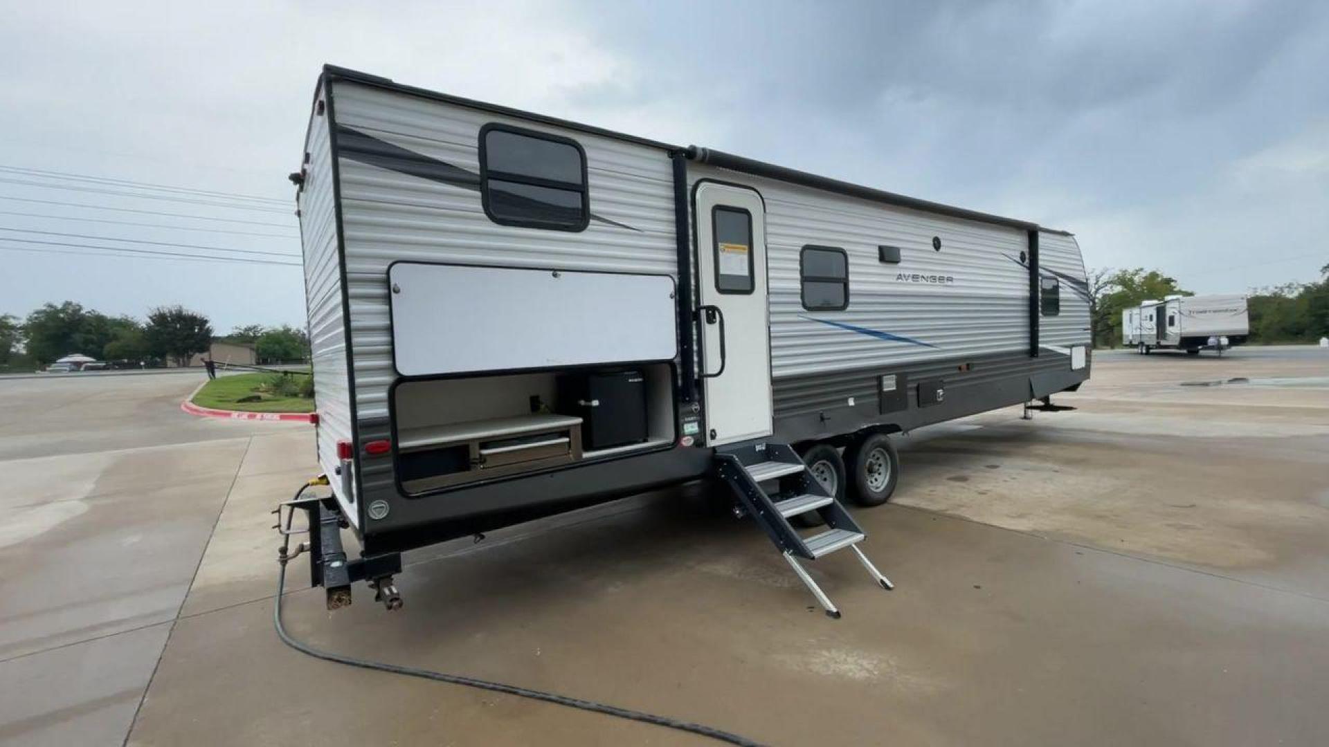 2021 FOREST RIVER AVENGER 29QBS (5ZT2AVUB0MB) , Length: 36.92 ft. | Dry Weight: 7,030 lbs. | Slides: 1 transmission, located at 4319 N Main St, Cleburne, TX, 76033, (817) 678-5133, 32.385960, -97.391212 - The 2021 Forest River Avenger 29QBS presents a sleek and practical exterior designed to support comfortable travel and outdoor convenience. Measuring 36.92 feet in length and equipped with a single slide, this model offers a spacious interior while maintaining an efficient profile. With a dry weight - Photo#1