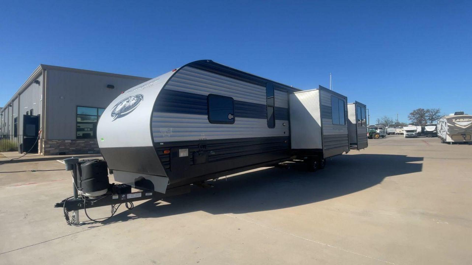 2021 FOREST RIVER CHEROKEE 306MM (4X4TCKG29MX) , Length: 39.92 ft. | Dry Weight: 8,578 lbs. | Gross Weight: 11,100 lbs. | Slides: 3 transmission, located at 4319 N Main St, Cleburne, TX, 76033, (817) 678-5133, 32.385960, -97.391212 - The 2021 Forest River Cherokee 306MM is a spacious and stylish travel trailer, ideal for families or couples who enjoy both relaxation and entertainment on the road. Its rear living area design and premium features make it a standout choice for extended adventures or weekend getaways. The dimensions - Photo#5