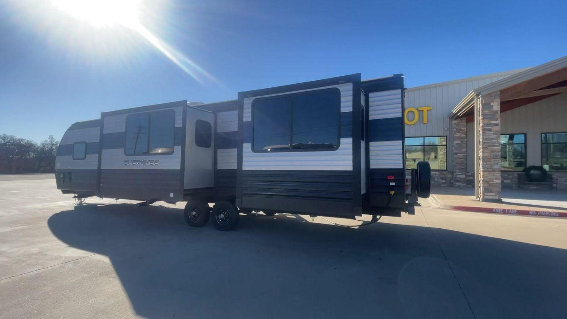 2021 FOREST RIVER CHEROKEE 306MM (4X4TCKG29MX) , Length: 39.92 ft. | Dry Weight: 8,578 lbs. | Gross Weight: 11,100 lbs. | Slides: 3 transmission, located at 4319 N Main St, Cleburne, TX, 76033, (817) 678-5133, 32.385960, -97.391212 - The 2021 Forest River Cherokee 306MM is a spacious and stylish travel trailer, ideal for families or couples who enjoy both relaxation and entertainment on the road. Its rear living area design and premium features make it a standout choice for extended adventures or weekend getaways. The dimensions - Photo#7