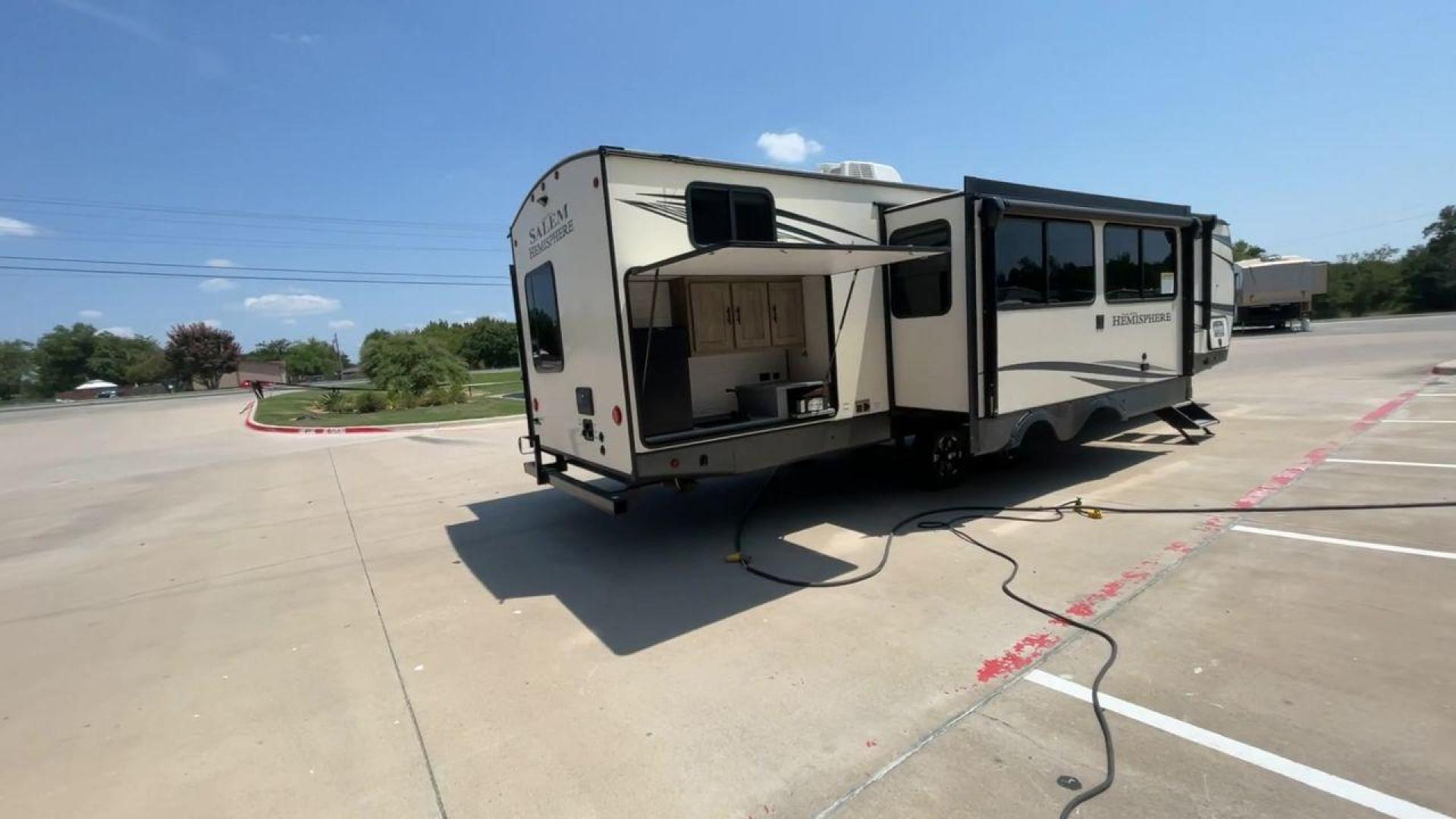 2021 FOREST RIVER HEMISPHERE 310BHS (4X4TSBG21MU) , Length: 38.67 ft. | Dry Weight: 9,088 lbs. | Slides: 3 transmission, located at 4319 N Main St, Cleburne, TX, 76033, (817) 678-5133, 32.385960, -97.391212 - Photo#1