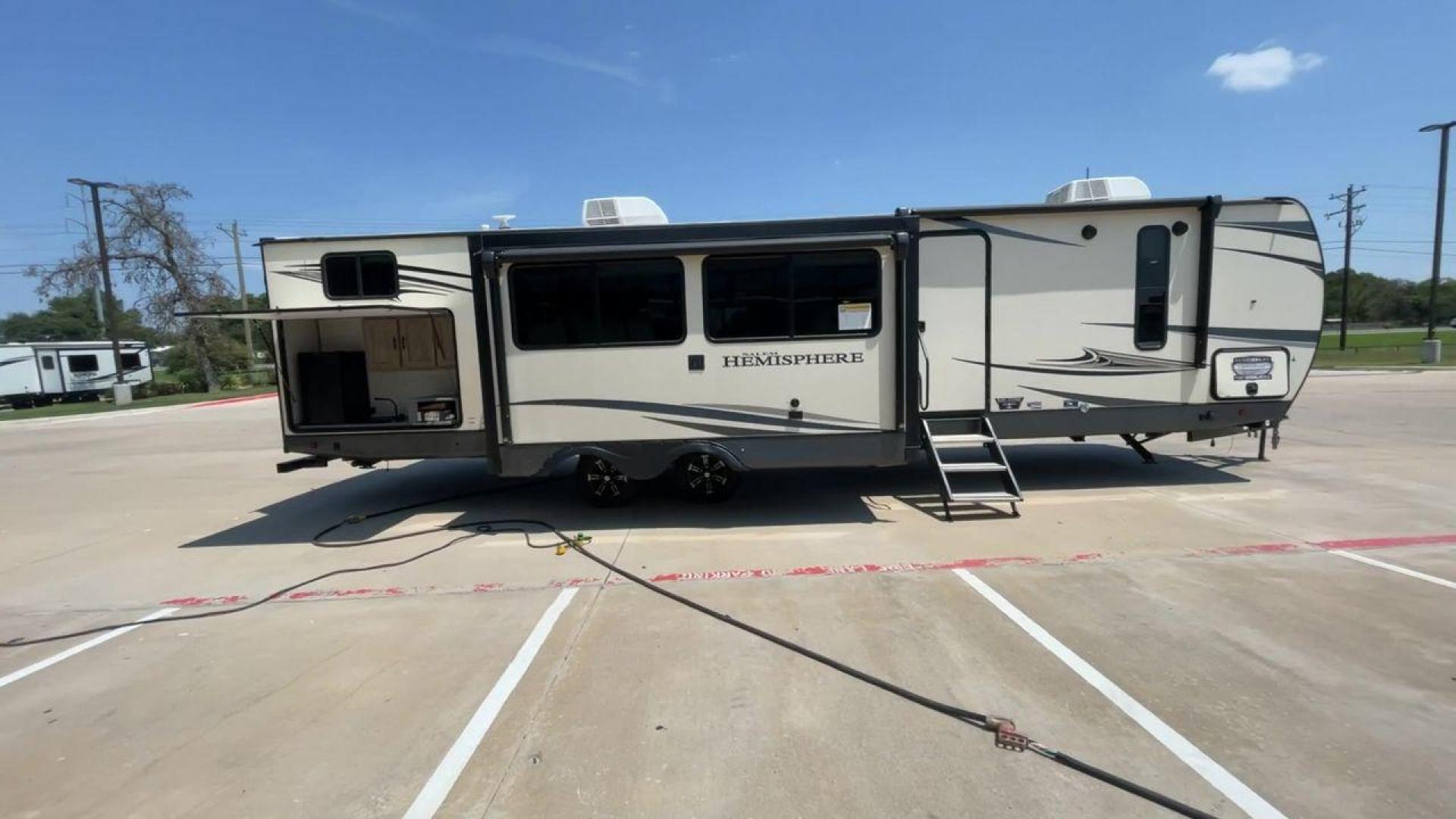 2021 FOREST RIVER HEMISPHERE 310BHS (4X4TSBG21MU) , Length: 38.67 ft. | Dry Weight: 9,088 lbs. | Slides: 3 transmission, located at 4319 N Main St, Cleburne, TX, 76033, (817) 678-5133, 32.385960, -97.391212 - Photo#2