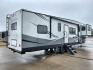 2021 FOREST RIVER IMPRESSION 320FL (5ZT3MPXB1MD) , Length: 40.17 ft | Dry Weight: 10,303 lbs | Gross Weight: 14,535 lbs | Slides: 4 transmission, located at 4319 N Main St, Cleburne, TX, 76033, (817) 678-5133, 32.385960, -97.391212 - The 2021 Forest River Impression 320FL fifth wheel RV is built for durability and style. Its sleek white fiberglass body is accented with bold black and blue graphics, giving it a modern and aerodynamic look. The front cap features a distinctive aerodynamic profile with the Impression logo prominent - Photo#25