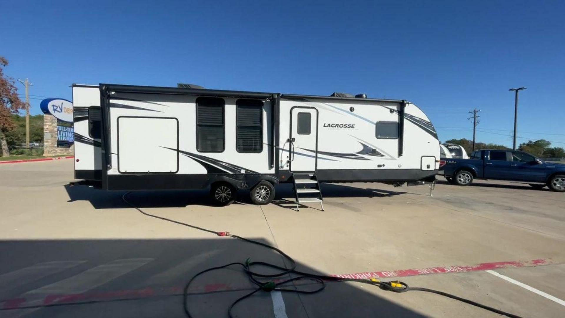 2021 FOREST RIVER LACROSSE 3399SE (5ZT2LCZB5MB) , Length: 37.58 ft. | Dry Weight: 8,678 lbs. | Slides: 3 transmission, located at 4319 N Main St, Cleburne, TX, 76033, (817) 678-5133, 32.385960, -97.391212 - Photo#2