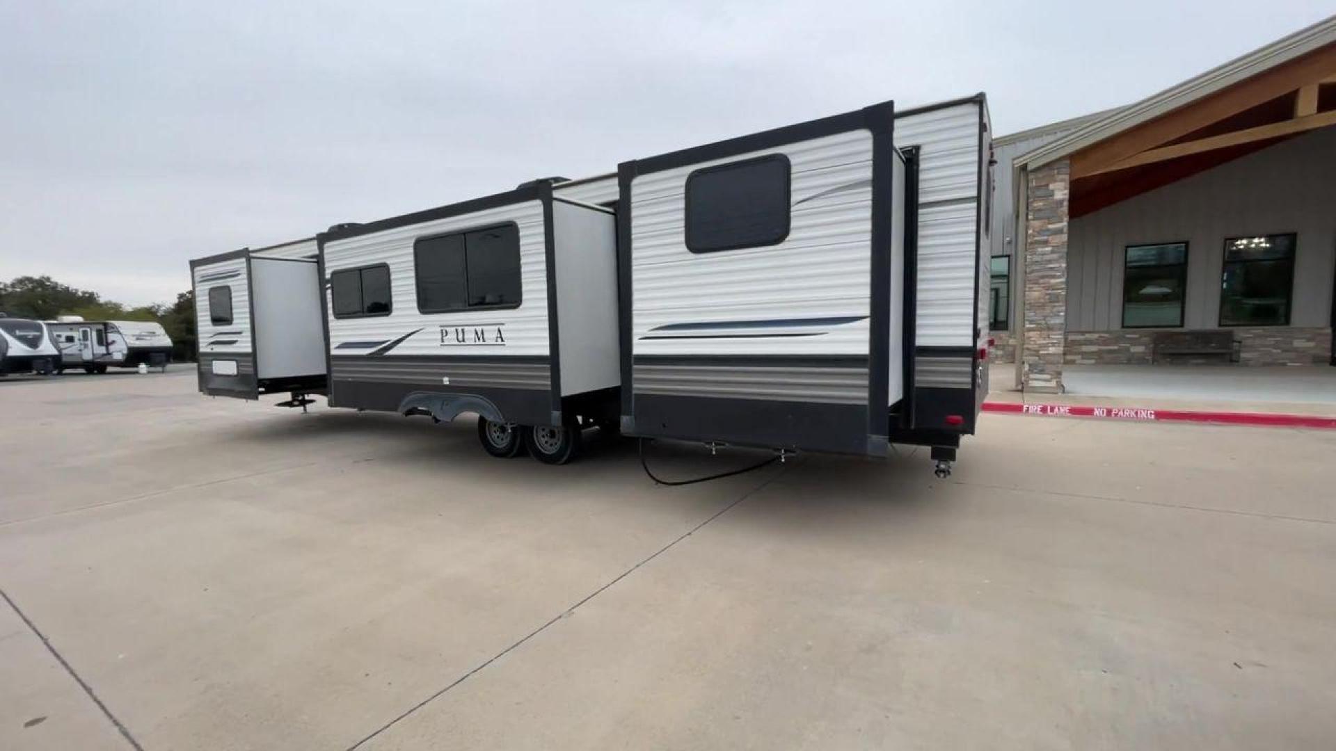 2021 FOREST RIVER PUMA 39PQB - (4X4TPUR24MP) , Length: 42.08 ft | Dry Weight: 10,709 lbs. lbs | Gross Weight: 13,413 lbs. | Slides: 4 transmission, located at 4319 N Main St, Cleburne, TX, 76033, (817) 678-5133, 32.385960, -97.391212 - Photo#7