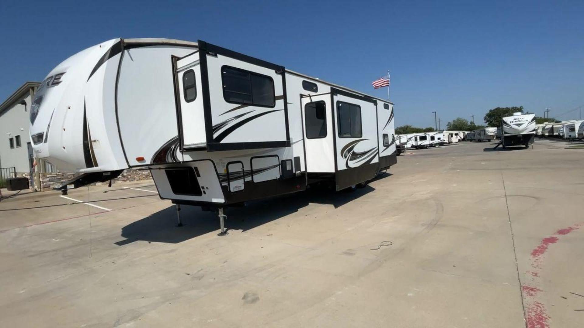 2021 FOREST RIVER SABRE 37FLL (5ZT3SR2B3M6) , Length: 42.75 ft. | Dry Weight: 11,918 lbs. | Slides: 4 transmission, located at 4319 N Main St, Cleburne, TX, 76033, (817) 678-5133, 32.385960, -97.391212 - The 2021 Forest River Sabre 37FLL is a large, luxurious fifth-wheel trailer that measures 42.75 feet in length and features four slide-outs. It has an aerodynamic front cap with the Sabre Cobalt logo and bold, modern graphics. The curved front end is designed to reduce wind drag when towing. The rea - Photo#5