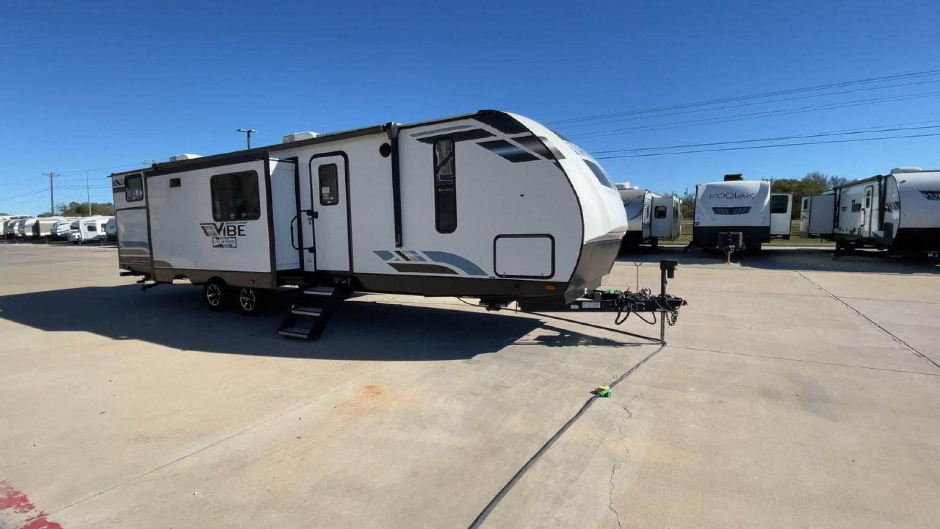 2021 FOREST RIVER VIBE 34BH (4X4TVBK20M4) , Length: 39.42 ft. | Dry Weight: 8,164 lbs. | Slides: 3 transmission, located at 4319 N Main St, Cleburne, TX, 76033, (817) 678-5133, 32.385960, -97.391212 - Photo#3