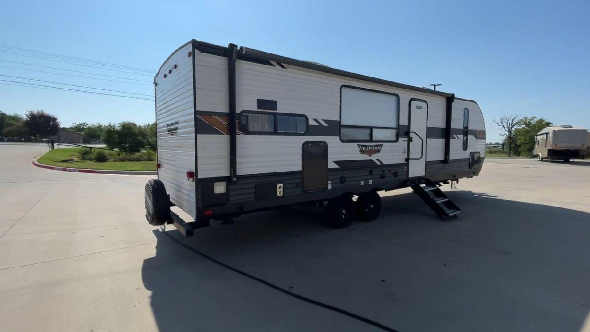 2021 FOREST RIVER WILDWOOD 27RK (4X4TWDC28MA) , Length: 33.67 ft. | Dry Weight: 6,798 lbs. | Slides: 1 transmission, located at 4319 N Main St, Cleburne, TX, 76033, (817) 678-5133, 32.385960, -97.391212 - Photo#1