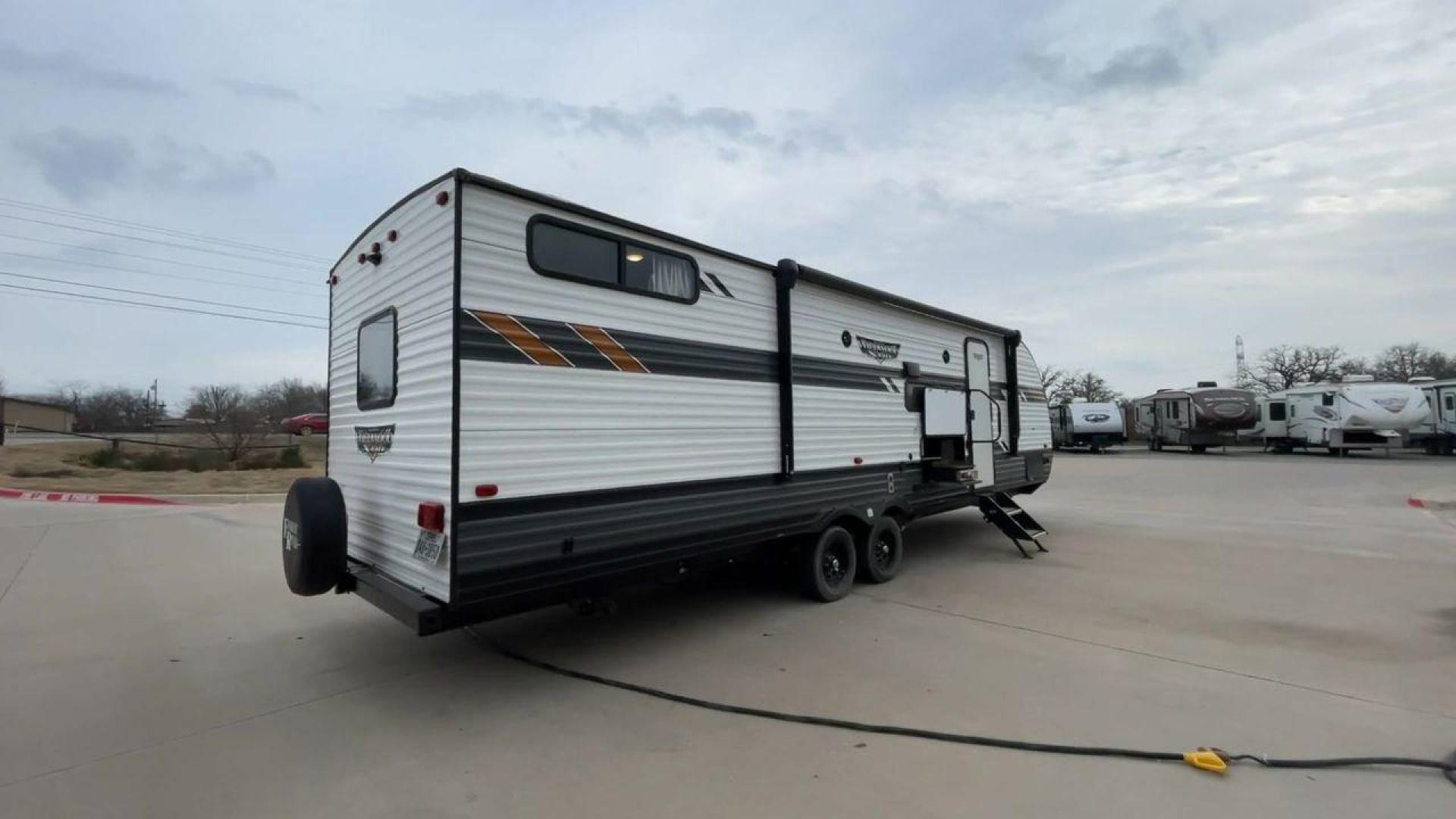 2021 FOREST RIVER WILDWOOD 28VBXL (4X4TWDD25M7) , Length: 33.33 ft. | Dry Weight: 6,486 lbs. | Slides: 1 transmission, located at 4319 N Main St, Cleburne, TX, 76033, (817) 678-5133, 32.385960, -97.391212 - Explore the ideal mix of comfort and family-friendly excitement with the 2021 Forest River Wildwood 28VBXL. This 33-foot travel trailer offers a spacious and versatile interior perfect for families and friends looking to create lasting camping memories. This Wildwood 28VBXL model showcases a distinc - Photo#1