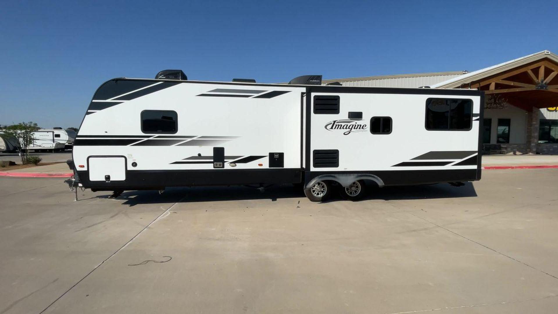 2021 GRAND DESIGN IMAGINE 3100RD (573TE3725M6) , Length: 35.92 ft. | Dry Weight: 7,778 lbs. | Gross Weight: 9,495 lbs. | Slides: 2 transmission, located at 4319 N Main St, Cleburne, TX, 76033, (817) 678-5133, 32.385960, -97.391212 - The 2021 Grand Design Imagine 3100RD is a spacious and thoughtfully designed travel trailer that combines luxury, functionality, and comfort for travelers looking to enjoy extended adventures. With its open floor plan, residential-style features, and high-quality construction, this model is ideal fo - Photo#6