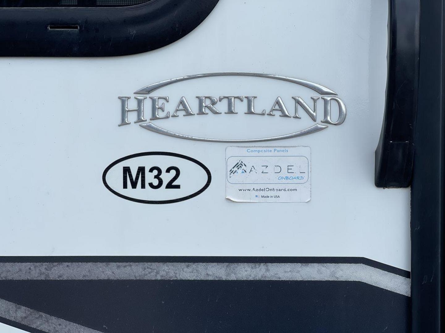 2021 HEARTLAND MALLARD M32 (5SFNB3524ME) , Length: 34.79 ft. | Dry Weight: 6,926 lbs. | Gross Weight: 8,600 lbs. | Slides: 2 transmission, located at 4319 N Main St, Cleburne, TX, 76033, (817) 678-5133, 32.385960, -97.391212 - The 2021 Heartland Mallard M32 is a sleek and modern travel trailer with a length of 34.79 feet and a dry weight of 6,926 lbs. The gross weight is 8,600 lbs, making it easily towable by larger SUVs and trucks. It features a clean, white exterior with stylish blue and black decals that run along the - Photo#22