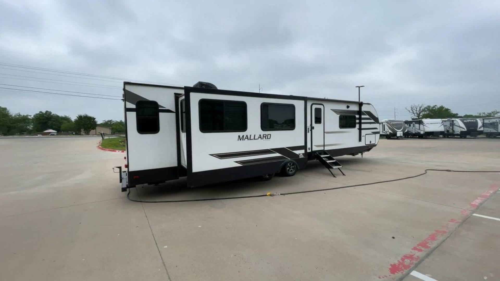 2021 HEARTLAND MALLARD M335 (5SFNB4027ME) , located at 4319 N Main St, Cleburne, TX, 76033, (817) 678-5133, 32.385960, -97.391212 - Photo#1