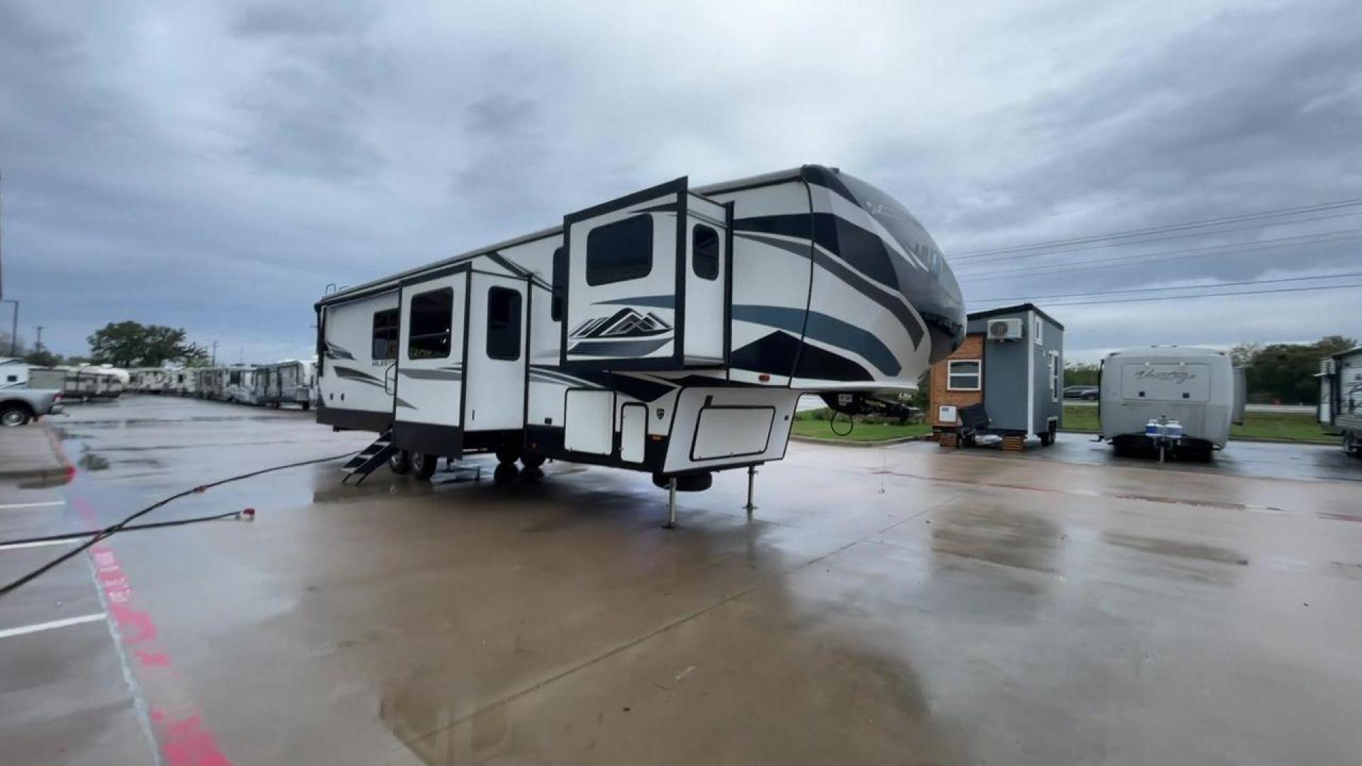 2021 HEARTLAND MILESTONE 370FLMB (5SFMG4521ME) , Length: 44.58 ft. | Dry Weight: 12,520 lbs. | GVWR: 15,500 lbs. | Slides: 5 transmission, located at 4319 N Main St, Cleburne, TX, 76033, (817) 678-5133, 32.385960, -97.391212 - Experience the ideal fusion of adventure and comfort with the Heartland Milestone 370FLMB fifth wheel from 2021. This roomy and well-equipped RV is made to give you all the conveniences and comforts you require for enjoyable outdoor travels. The dimensions for this unit are 44.58 ft in length, 8 - Photo#3