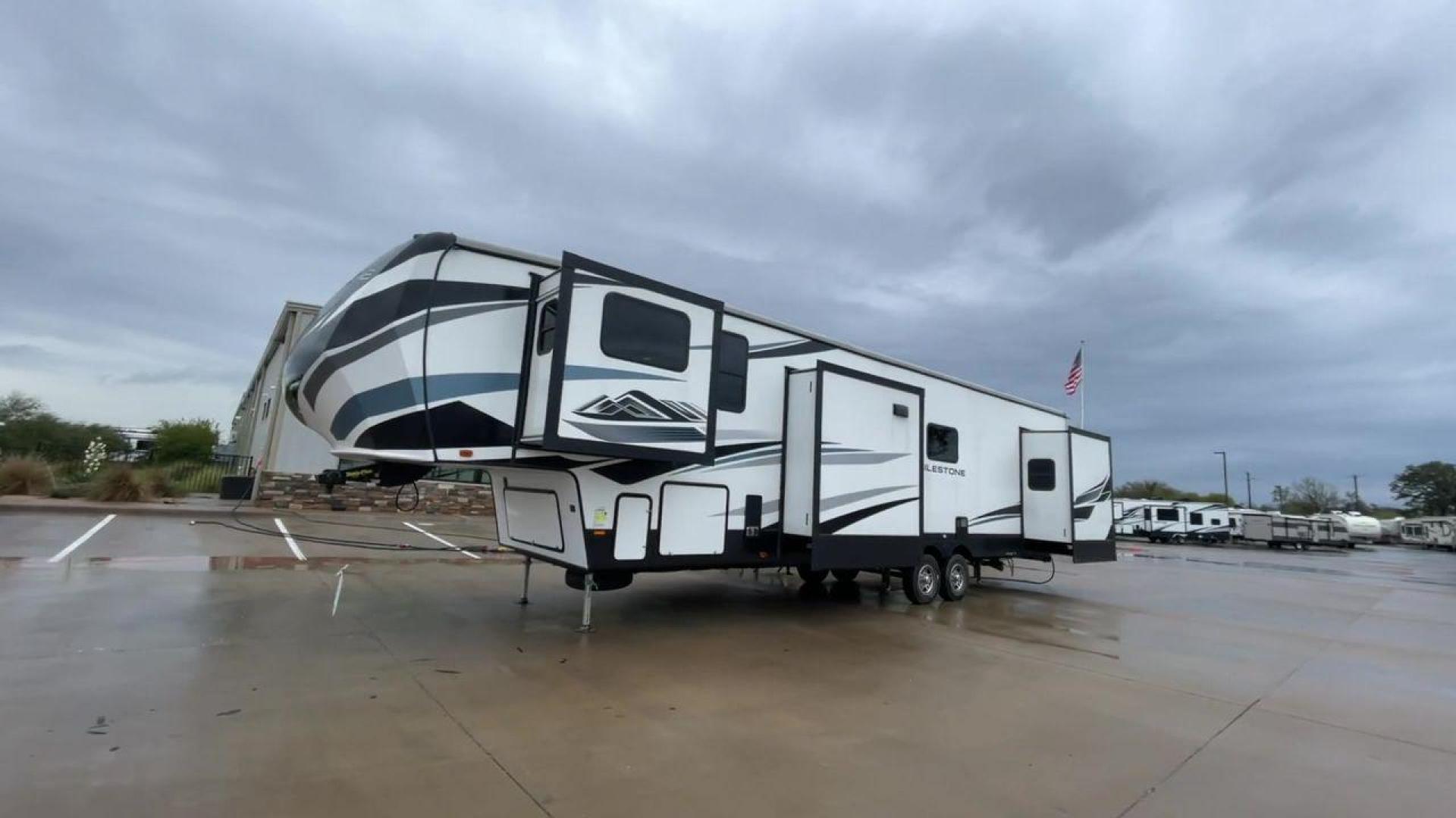 2021 HEARTLAND MILESTONE 370FLMB (5SFMG4521ME) , Length: 44.58 ft. | Dry Weight: 12,520 lbs. | GVWR: 15,500 lbs. | Slides: 5 transmission, located at 4319 N Main St, Cleburne, TX, 76033, (817) 678-5133, 32.385960, -97.391212 - Experience the ideal fusion of adventure and comfort with the Heartland Milestone 370FLMB fifth wheel from 2021. This roomy and well-equipped RV is made to give you all the conveniences and comforts you require for enjoyable outdoor travels. The dimensions for this unit are 44.58 ft in length, 8 - Photo#5