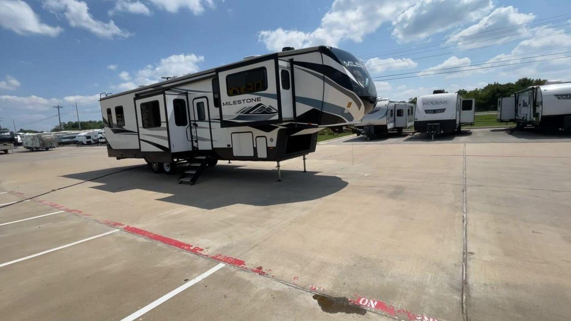 2021 HEARTLAND MILESTONE 379FLML (5SFMG4426ME) , Length: 44.17 ft. | Dry Weight: 12,600 lbs. | Gross Weight: 15,000 lbs. | Slides: 5 transmission, located at 4319 N Main St, Cleburne, TX, 76033, (817) 678-5133, 32.385960, -97.391212 - The 2021 Heartland Milestone 379FLML is 44.17 feet in length and has a dry weight of 12,600 pounds, with a gross weight capability of 15,000 pounds. This type of RV is intended for extended living and luxurious travel. It comes with five slide-outs that dramatically increase interior space, creating - Photo#3