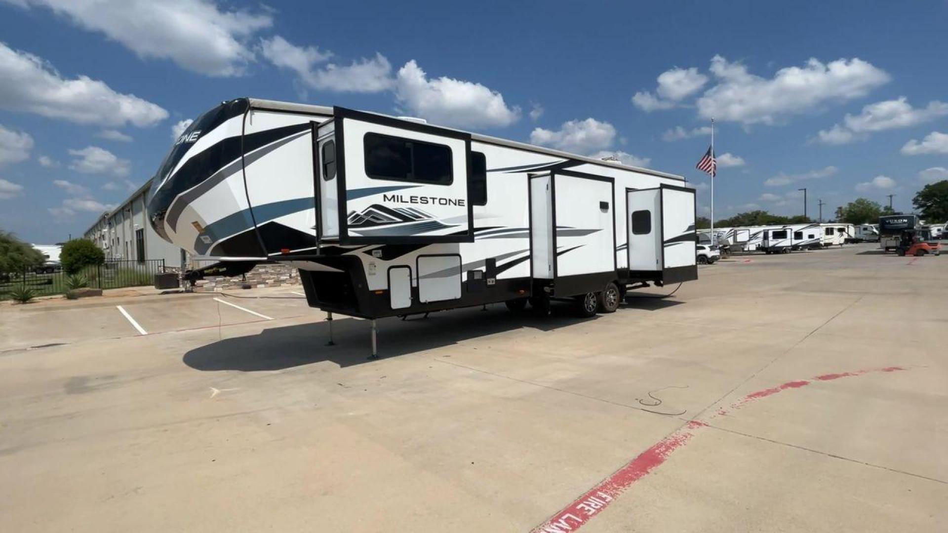 2021 HEARTLAND MILESTONE 379FLML (5SFMG4426ME) , Length: 44.17 ft. | Dry Weight: 12,600 lbs. | Gross Weight: 15,000 lbs. | Slides: 5 transmission, located at 4319 N Main St, Cleburne, TX, 76033, (817) 678-5133, 32.385960, -97.391212 - The 2021 Heartland Milestone 379FLML is 44.17 feet in length and has a dry weight of 12,600 pounds, with a gross weight capability of 15,000 pounds. This type of RV is intended for extended living and luxurious travel. It comes with five slide-outs that dramatically increase interior space, creating - Photo#5