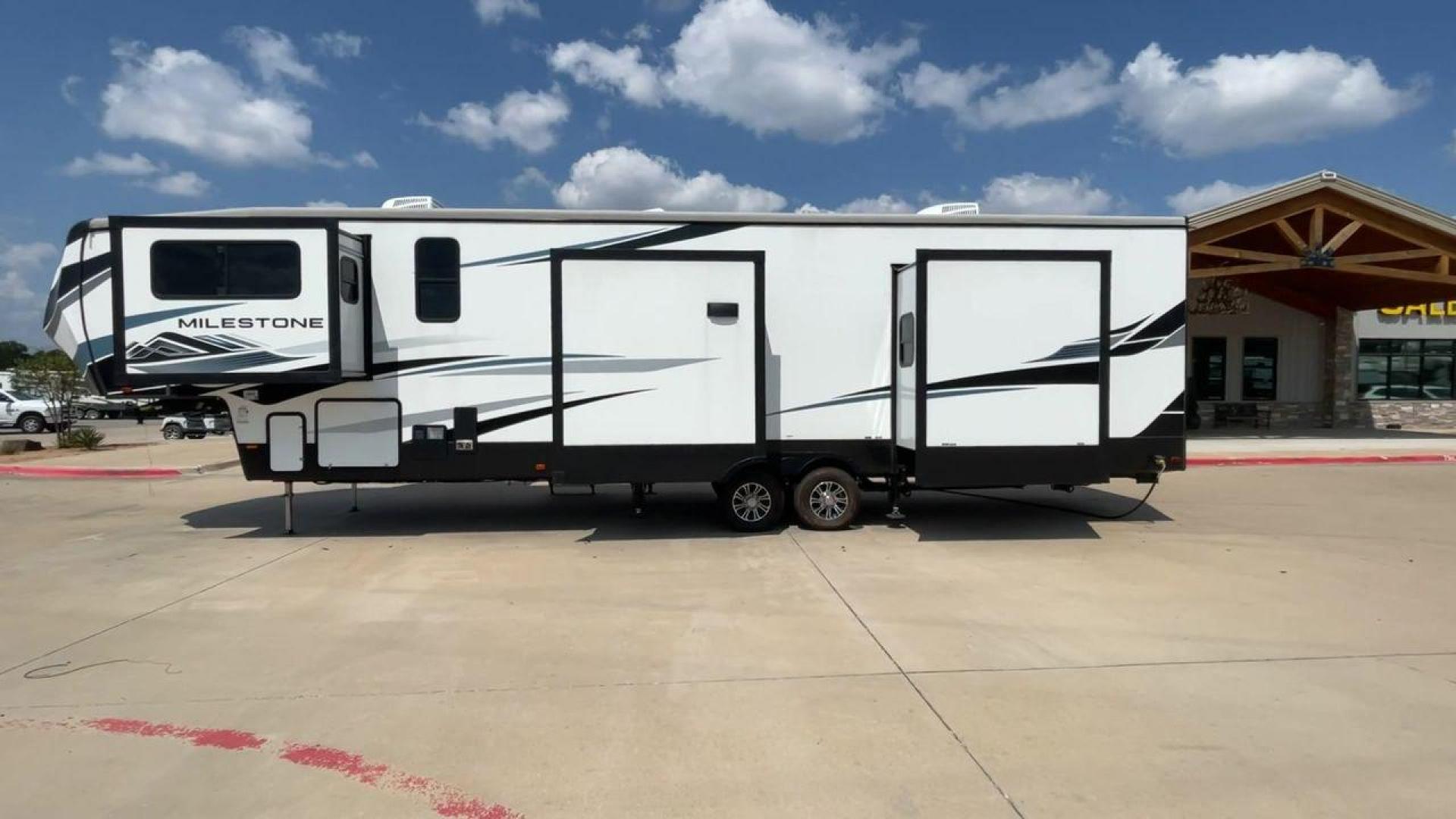 2021 HEARTLAND MILESTONE 379FLML (5SFMG4426ME) , Length: 44.17 ft. | Dry Weight: 12,600 lbs. | Gross Weight: 15,000 lbs. | Slides: 5 transmission, located at 4319 N Main St, Cleburne, TX, 76033, (817) 678-5133, 32.385960, -97.391212 - The 2021 Heartland Milestone 379FLML is 44.17 feet in length and has a dry weight of 12,600 pounds, with a gross weight capability of 15,000 pounds. This type of RV is intended for extended living and luxurious travel. It comes with five slide-outs that dramatically increase interior space, creating - Photo#6