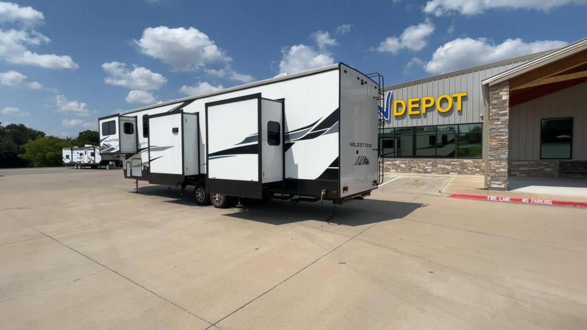 2021 HEARTLAND MILESTONE 379FLML (5SFMG4426ME) , Length: 44.17 ft. | Dry Weight: 12,600 lbs. | Gross Weight: 15,000 lbs. | Slides: 5 transmission, located at 4319 N Main St, Cleburne, TX, 76033, (817) 678-5133, 32.385960, -97.391212 - The 2021 Heartland Milestone 379FLML is 44.17 feet in length and has a dry weight of 12,600 pounds, with a gross weight capability of 15,000 pounds. This type of RV is intended for extended living and luxurious travel. It comes with five slide-outs that dramatically increase interior space, creating - Photo#7