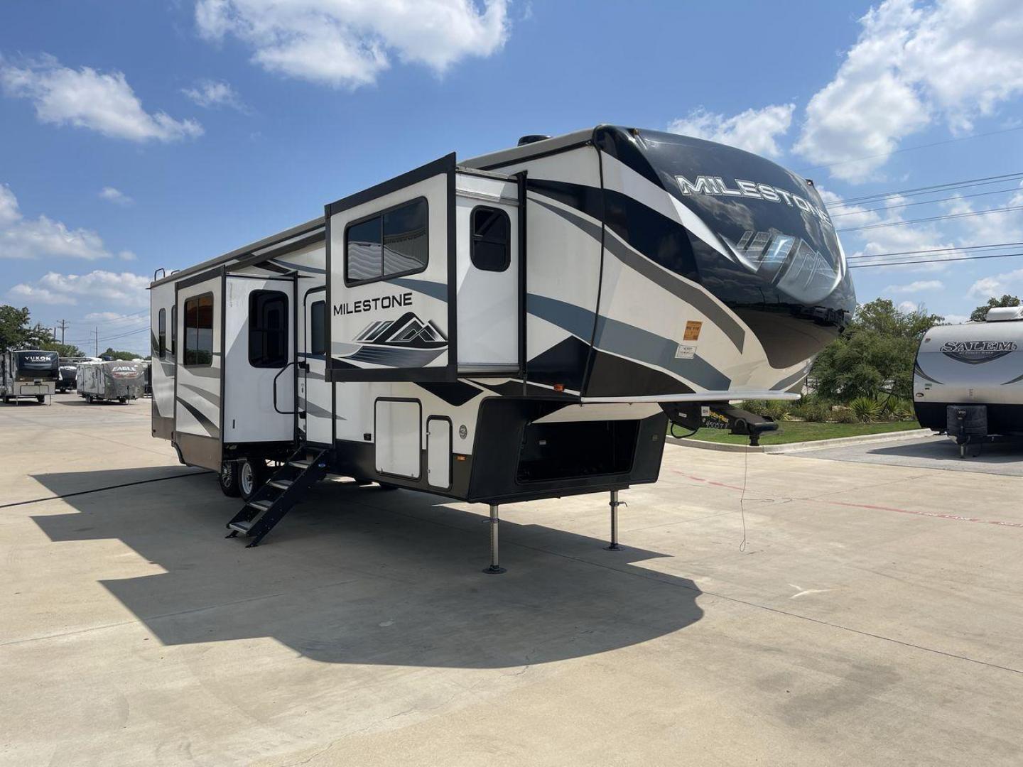 2021 HEARTLAND MILESTONE 379FLML (5SFMG4426ME) , Length: 44.17 ft. | Dry Weight: 12,600 lbs. | Gross Weight: 15,000 lbs. | Slides: 5 transmission, located at 4319 N Main St, Cleburne, TX, 76033, (817) 678-5133, 32.385960, -97.391212 - The 2021 Heartland Milestone 379FLML is 44.17 feet in length and has a dry weight of 12,600 pounds, with a gross weight capability of 15,000 pounds. This type of RV is intended for extended living and luxurious travel. It comes with five slide-outs that dramatically increase interior space, creating - Photo#23