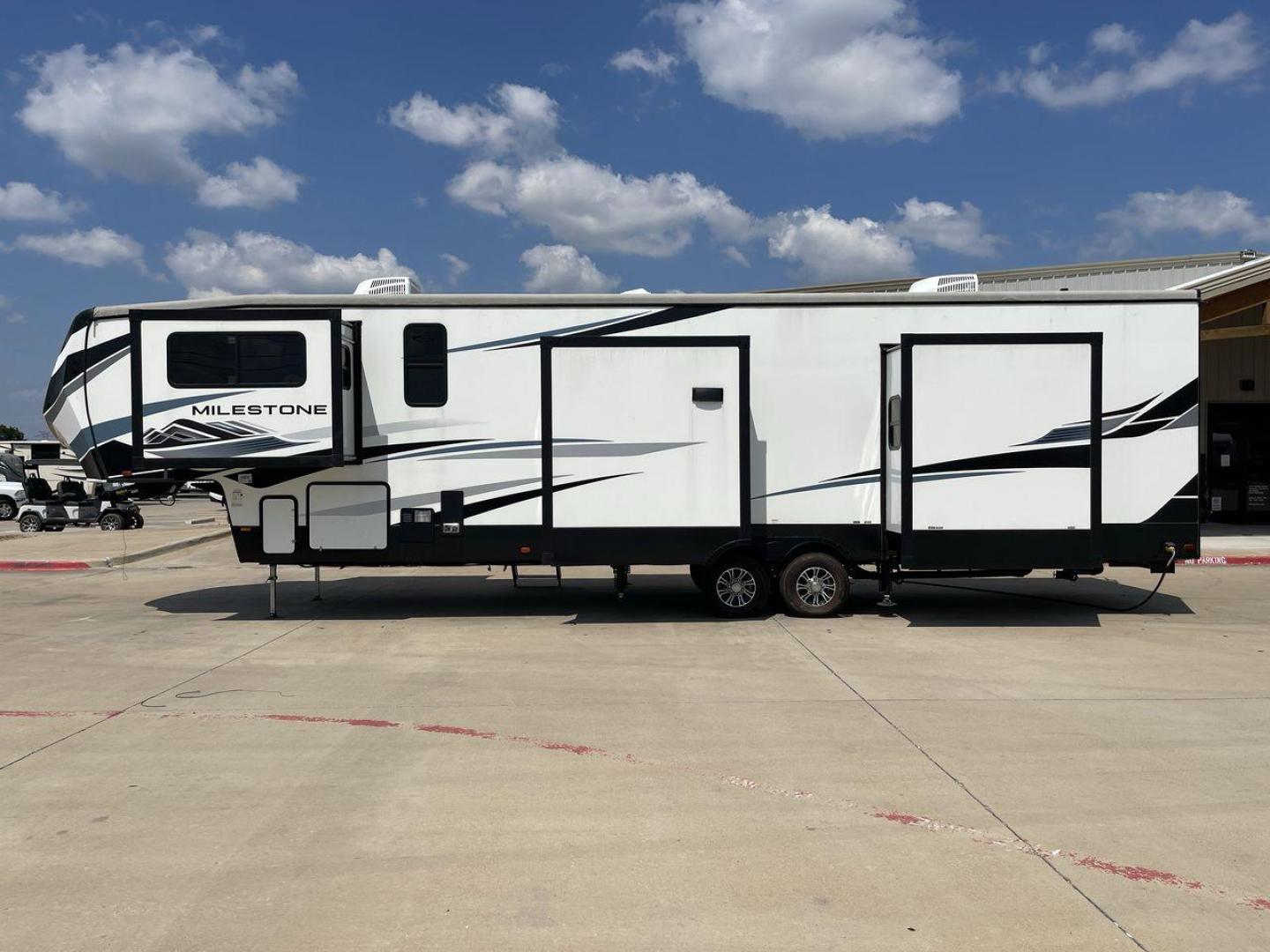 2021 HEARTLAND MILESTONE 379FLML (5SFMG4426ME) , Length: 44.17 ft. | Dry Weight: 12,600 lbs. | Gross Weight: 15,000 lbs. | Slides: 5 transmission, located at 4319 N Main St, Cleburne, TX, 76033, (817) 678-5133, 32.385960, -97.391212 - The 2021 Heartland Milestone 379FLML is 44.17 feet in length and has a dry weight of 12,600 pounds, with a gross weight capability of 15,000 pounds. This type of RV is intended for extended living and luxurious travel. It comes with five slide-outs that dramatically increase interior space, creating - Photo#24