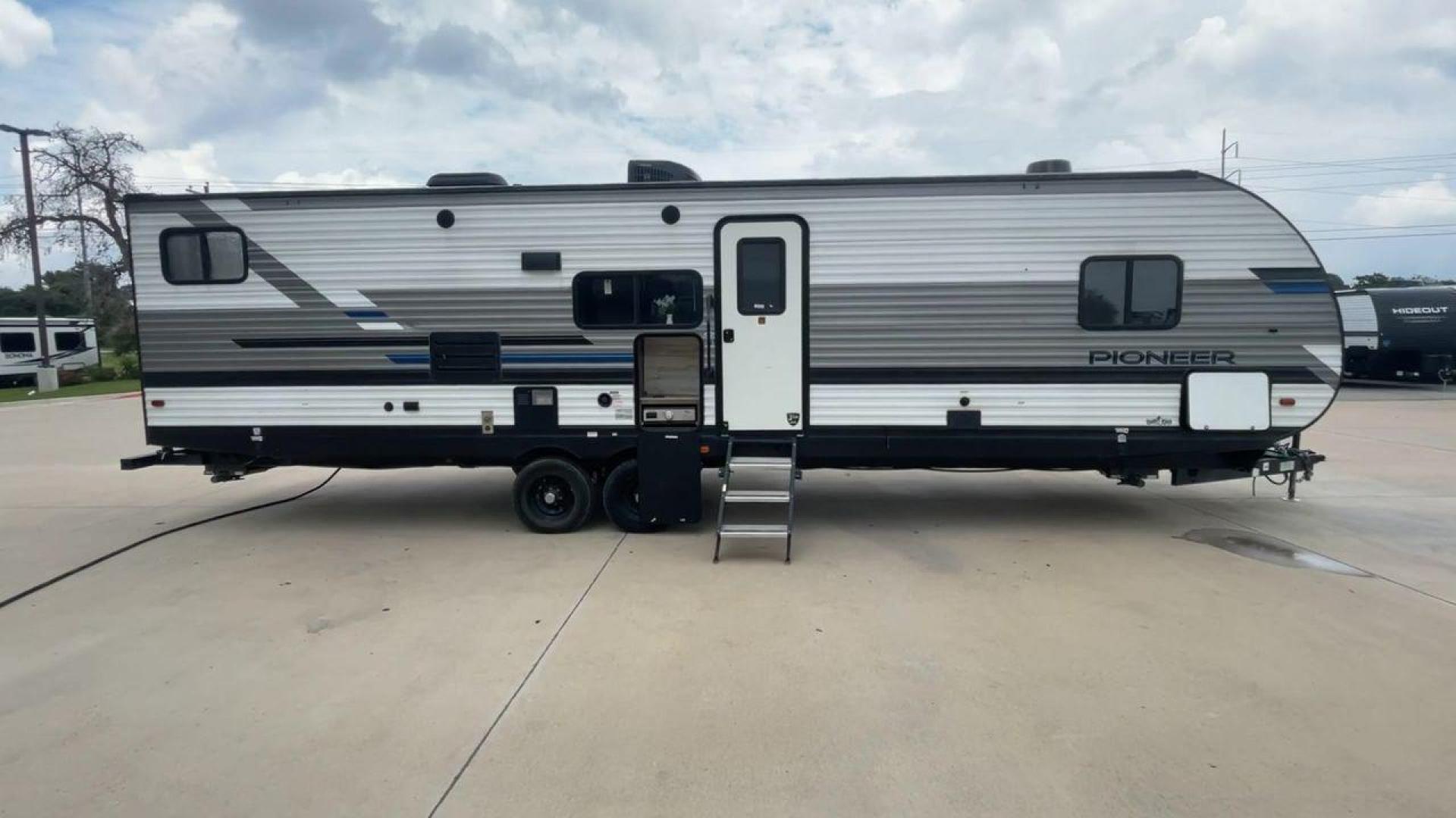 2021 WHITE HEARTLAND PIONEER BH322 (5SFPB3721ME) , Length: 36.92 ft. | Dry Weight: 7,436 lbs. | Gross Weight: 9,000 lbs. | Slides: 1 transmission, located at 4319 N Main St, Cleburne, TX, 76033, (817) 678-5133, 32.385960, -97.391212 - This 2021 Heartland Pioneer BH322 travel trailer measures 36.92 ft in length, 8.04 ft in width, 11.33 ft in height, and 6.67 ft interior height. This unit is easily towable with only 7,436 lbs dry weight with a payload capacity of 1,548 lbs. The unit has a GVWR of 9,000 lbs and a hitch weight of 788 - Photo#2