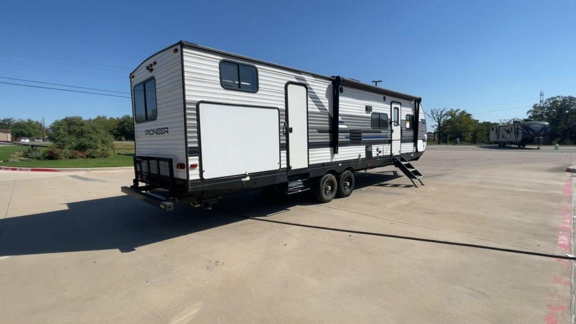 2021 HEARTLAND PIONEER DS320 (5SFPB3725ME) , Length: 37.42 ft. | Dry Weight: 7,696 lbs. | Gross Weight: 9,000 lbs. | Slides: 2 transmission, located at 4319 N Main St, Cleburne, TX, 76033, (817) 678-5133, 32.385960, -97.391212 - The 2021 Heartland Pioneer DS320 is a spacious and well-designed travel trailer, perfect for large families or group trips. Measuring 37.42 feet in length with a dry weight of 7,696 lbs. and a gross weight of 9,000 lbs., this unit is built for comfortable travel while maintaining a manageable towing - Photo#1