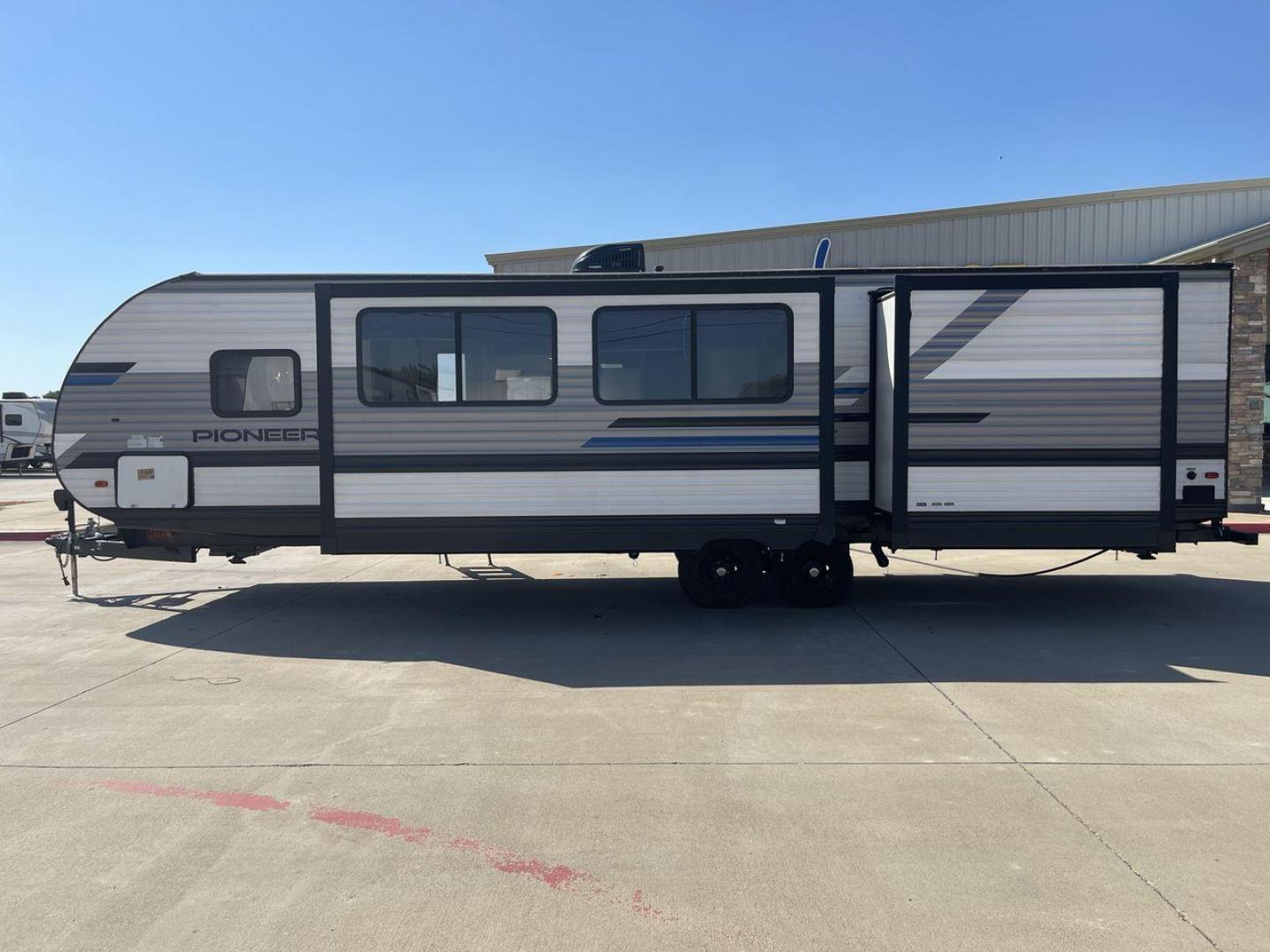 2021 HEARTLAND PIONEER DS320 (5SFPB3725ME) , Length: 37.42 ft. | Dry Weight: 7,696 lbs. | Gross Weight: 9,000 lbs. | Slides: 2 transmission, located at 4319 N Main St, Cleburne, TX, 76033, (817) 678-5133, 32.385960, -97.391212 - The 2021 Heartland Pioneer DS320 is a spacious and well-designed travel trailer, perfect for large families or group trips. Measuring 37.42 feet in length with a dry weight of 7,696 lbs. and a gross weight of 9,000 lbs., this unit is built for comfortable travel while maintaining a manageable towing - Photo#24