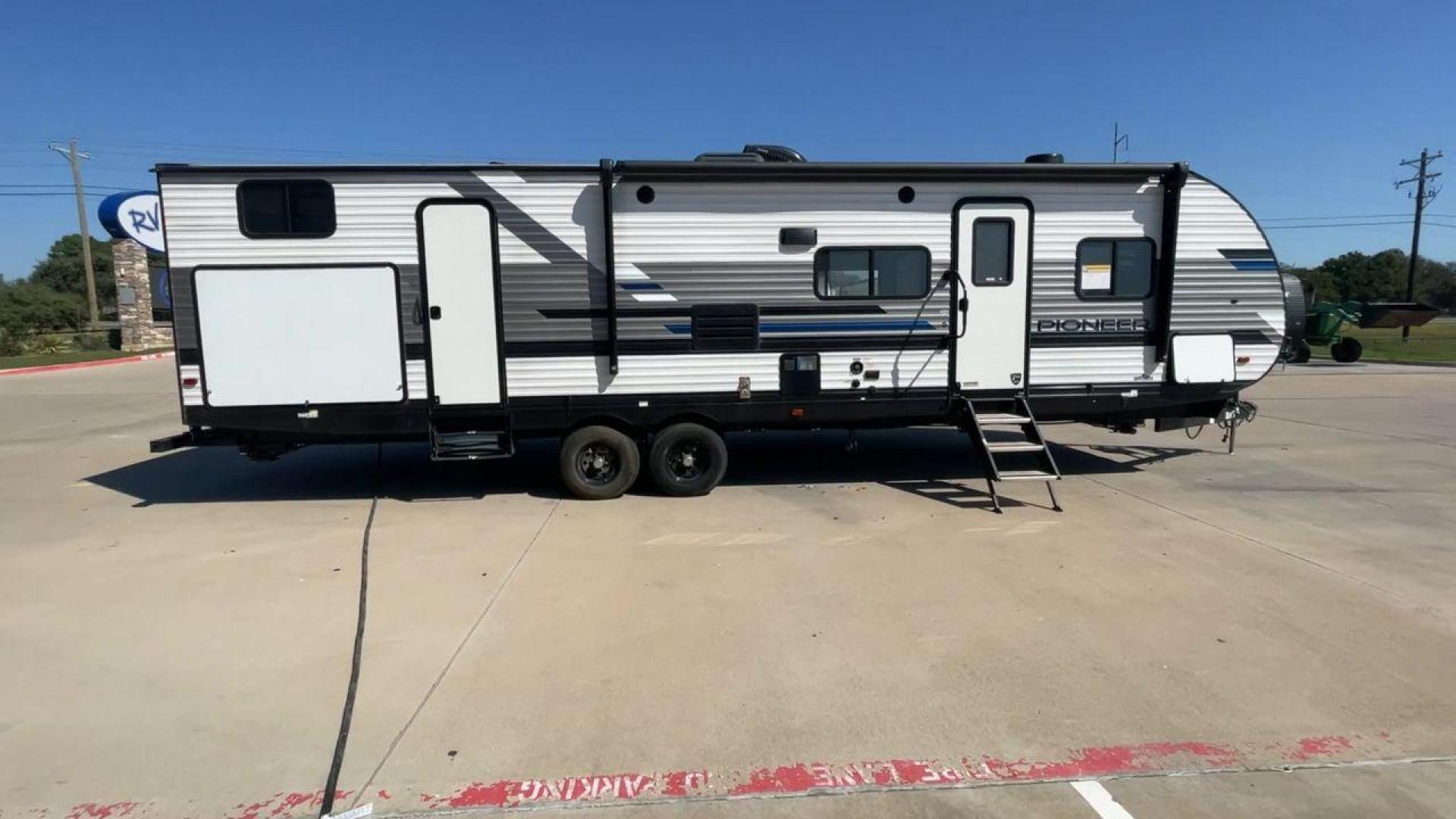 2021 HEARTLAND PIONEER DS320 (5SFPB3725ME) , Length: 37.42 ft. | Dry Weight: 7,696 lbs. | Gross Weight: 9,000 lbs. | Slides: 2 transmission, located at 4319 N Main St, Cleburne, TX, 76033, (817) 678-5133, 32.385960, -97.391212 - The 2021 Heartland Pioneer DS320 is a spacious and well-designed travel trailer, perfect for large families or group trips. Measuring 37.42 feet in length with a dry weight of 7,696 lbs. and a gross weight of 9,000 lbs., this unit is built for comfortable travel while maintaining a manageable towing - Photo#2