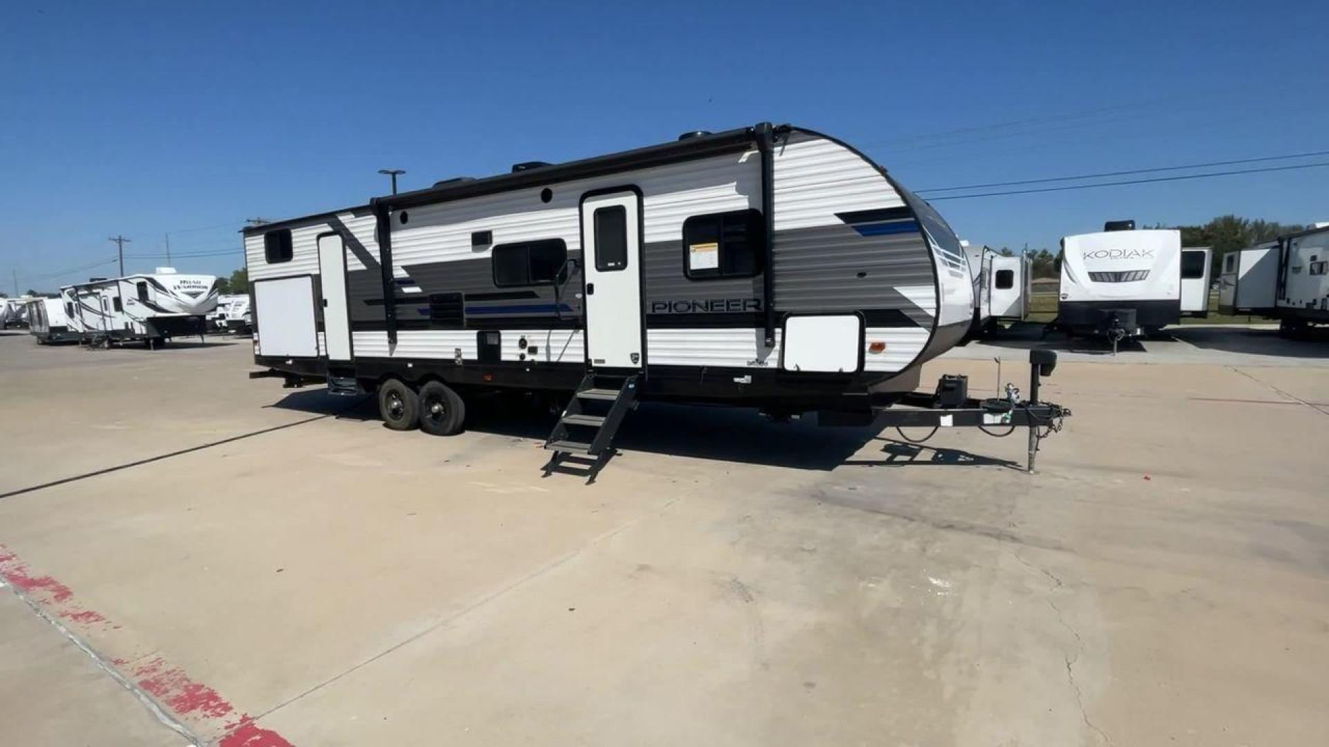 2021 HEARTLAND PIONEER DS320 (5SFPB3725ME) , Length: 37.42 ft. | Dry Weight: 7,696 lbs. | Gross Weight: 9,000 lbs. | Slides: 2 transmission, located at 4319 N Main St, Cleburne, TX, 76033, (817) 678-5133, 32.385960, -97.391212 - The 2021 Heartland Pioneer DS320 is a spacious and well-designed travel trailer, perfect for large families or group trips. Measuring 37.42 feet in length with a dry weight of 7,696 lbs. and a gross weight of 9,000 lbs., this unit is built for comfortable travel while maintaining a manageable towing - Photo#3