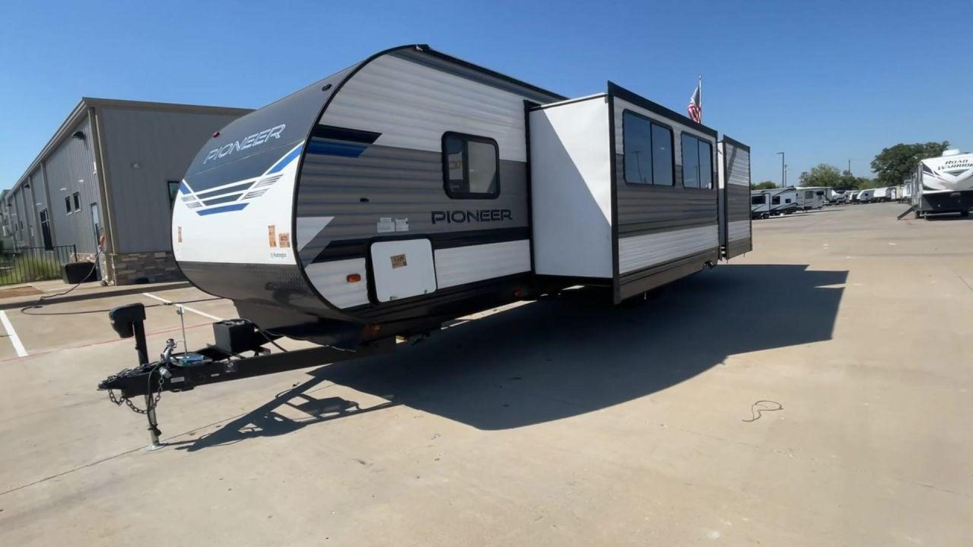 2021 HEARTLAND PIONEER DS320 (5SFPB3725ME) , Length: 37.42 ft. | Dry Weight: 7,696 lbs. | Gross Weight: 9,000 lbs. | Slides: 2 transmission, located at 4319 N Main St, Cleburne, TX, 76033, (817) 678-5133, 32.385960, -97.391212 - The 2021 Heartland Pioneer DS320 is a spacious and well-designed travel trailer, perfect for large families or group trips. Measuring 37.42 feet in length with a dry weight of 7,696 lbs. and a gross weight of 9,000 lbs., this unit is built for comfortable travel while maintaining a manageable towing - Photo#5