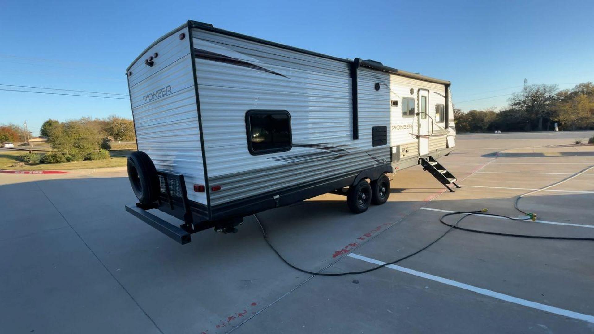 2021 HEARTLAND PIONEER QB300 (5SFPB3525ME) , Length: 35 ft. | Dry Weight: 6,896 lbs. | Gross Weight: 9,000 lbs. | Slides: 1 transmission, located at 4319 N Main St, Cleburne, TX, 76033, (817) 678-5133, 32.385960, -97.391212 - The 2021 Heartland Pioneer QB300 is a spacious and well-equipped travel trailer, perfect for family adventures. With a length of 35 feet, this model provides ample living space while maintaining a dry weight of 6,896 lbs. and a gross weight of 9,000 lbs. It includes 1 slide-out, optimizing interior - Photo#1