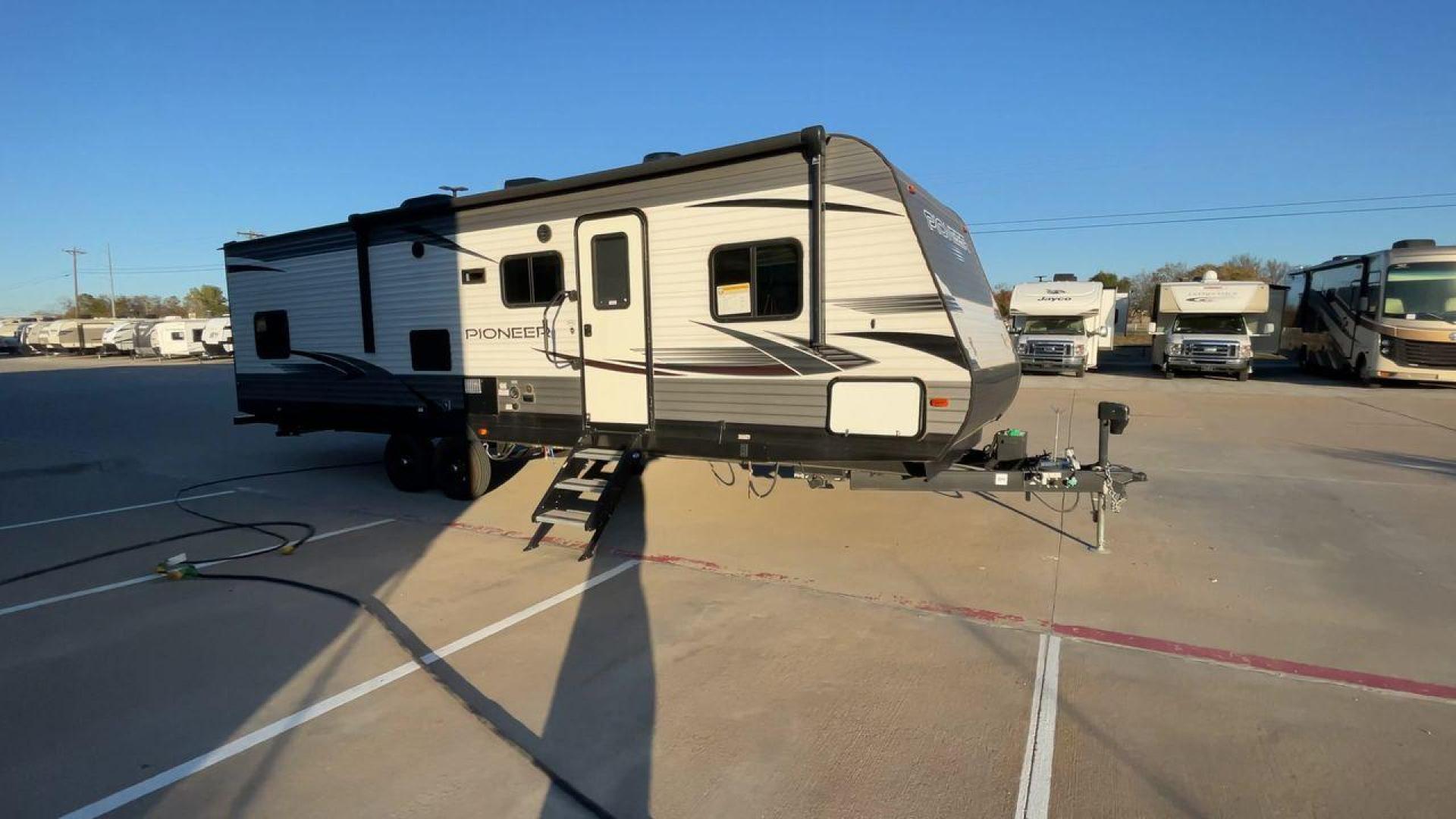 2021 HEARTLAND PIONEER QB300 (5SFPB3525ME) , Length: 35 ft. | Dry Weight: 6,896 lbs. | Gross Weight: 9,000 lbs. | Slides: 1 transmission, located at 4319 N Main St, Cleburne, TX, 76033, (817) 678-5133, 32.385960, -97.391212 - The 2021 Heartland Pioneer QB300 is a spacious and well-equipped travel trailer, perfect for family adventures. With a length of 35 feet, this model provides ample living space while maintaining a dry weight of 6,896 lbs. and a gross weight of 9,000 lbs. It includes 1 slide-out, optimizing interior - Photo#3