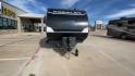 2021 HEARTLAND PROWLER 300BH (5SFPB3522ME) , Length: 33.92 ft. | Dry Weight: 6,785 lbs. | Gross Weight: 9,000 lbs. | Slides: 1 transmission, located at 4319 N Main St, Cleburne, TX, 76033, (817) 678-5133, 32.385960, -97.391212 - The 2021 Heartland Prowler 300BH boasts a sleek and modern design. The front features a black, aerodynamic nose cap adorned with a bold Prowler logo and a subtle graphic of a prowling animal. The sidewalls are finished in a crisp white with contrasting black and blue accents that run the length of t - Photo#4