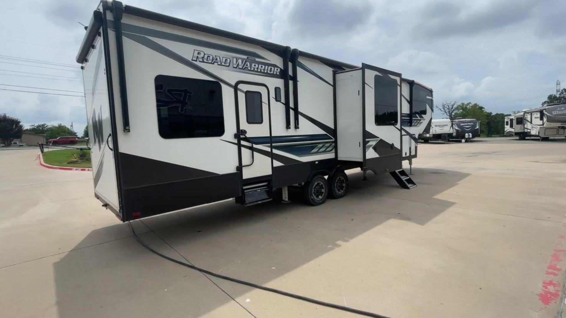 2021 HEARTLAND ROAD WARRIOR 351 (5SFCG4128ME) , Length: 41.5 ft. | Dry Weight: 14,530 lbs. | Gross Weight: 17,250 lbs. | Slides: 3 transmission, located at 4319 N Main St, Cleburne, TX, 76033, (817) 678-5133, 32.385960, -97.391212 - The 2021 Heartland Road Warrior 351 is a stunning and spacious toy hauler that combines luxury and practicality for adventurers. With an impressive length of 41.5 feet, it offers ample space for both relaxation and adventure. The unit features three slides, maximizing the living area for comfort. In - Photo#1