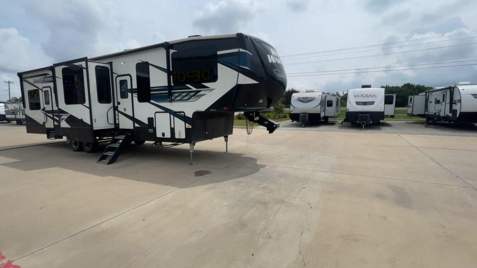 2021 HEARTLAND ROAD WARRIOR 351 (5SFCG4128ME) , Length: 41.5 ft. | Dry Weight: 14,530 lbs. | Gross Weight: 17,250 lbs. | Slides: 3 transmission, located at 4319 N Main St, Cleburne, TX, 76033, (817) 678-5133, 32.385960, -97.391212 - The 2021 Heartland Road Warrior 351 is a stunning and spacious toy hauler that combines luxury and practicality for adventurers. With an impressive length of 41.5 feet, it offers ample space for both relaxation and adventure. The unit features three slides, maximizing the living area for comfort. In - Photo#3