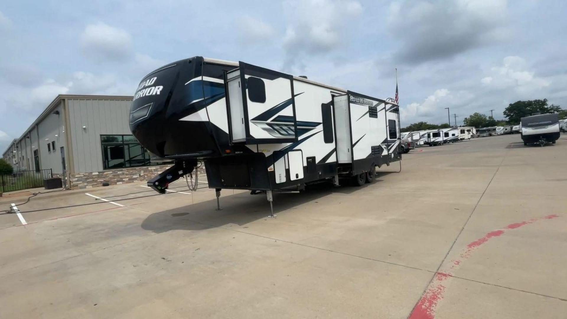 2021 HEARTLAND ROAD WARRIOR 351 (5SFCG4128ME) , Length: 41.5 ft. | Dry Weight: 14,530 lbs. | Gross Weight: 17,250 lbs. | Slides: 3 transmission, located at 4319 N Main St, Cleburne, TX, 76033, (817) 678-5133, 32.385960, -97.391212 - The 2021 Heartland Road Warrior 351 is a stunning and spacious toy hauler that combines luxury and practicality for adventurers. With an impressive length of 41.5 feet, it offers ample space for both relaxation and adventure. The unit features three slides, maximizing the living area for comfort. In - Photo#5