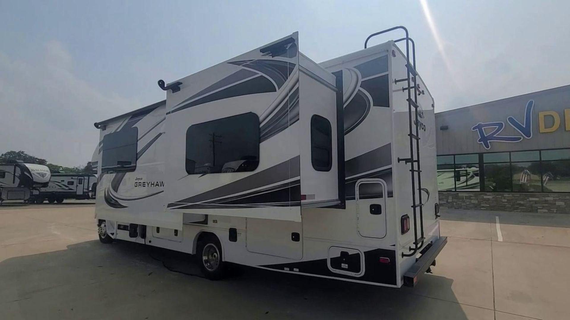 2021 WHITE JAYCO GREYHAWK 27U (1FDXE4FN7MD) , Length: 29.92 ft. | Gross Weight: 14,500 lbs. | Slides: 2 transmission, located at 4319 N Main St, Cleburne, TX, 76033, (817) 678-5133, 32.385960, -97.391212 - The 2021 Jayco Greyhawk 27U is the best Class C motorhome on the market. It's great for people who want to go on adventures on the open road. The length of this RV is 29.92 feet, and its gross weight is 14,500 pounds. It is the perfect size for getting around. With two slides, the Greyhawk 27U's int - Photo#1