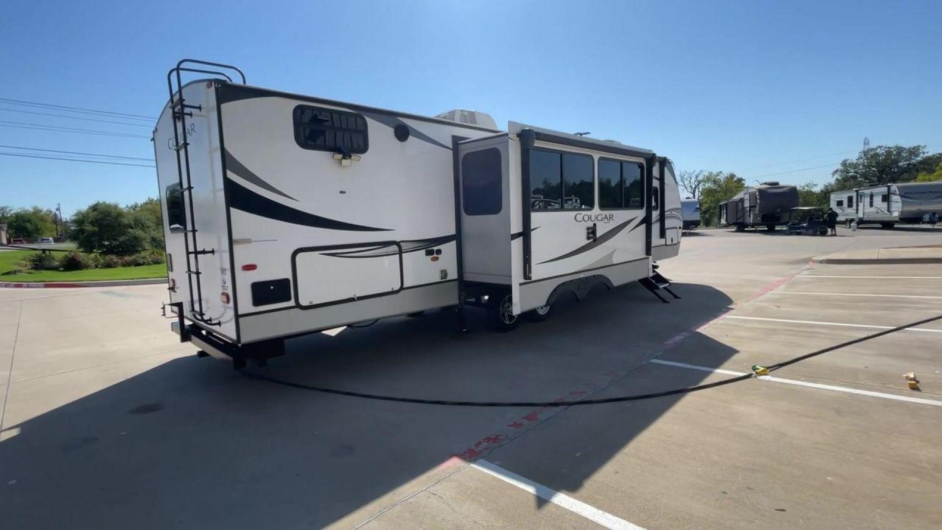 2021 KEYSTONE COUGAR 34TSB (4YDT34T26MV) , Length: 37.42 ft. | Dry Weight: 8,563 lbs. | Gross Weight: 10,500 lbs. | Slides: 3 transmission, located at 4319 N Main St, Cleburne, TX, 76033, (817) 678-5133, 32.385960, -97.391212 - Photo#1