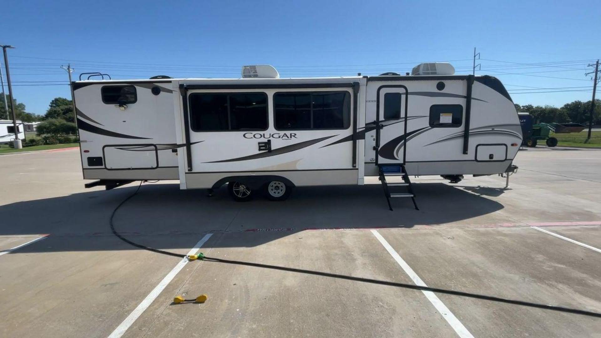 2021 KEYSTONE COUGAR 34TSB (4YDT34T26MV) , Length: 37.42 ft. | Dry Weight: 8,563 lbs. | Gross Weight: 10,500 lbs. | Slides: 3 transmission, located at 4319 N Main St, Cleburne, TX, 76033, (817) 678-5133, 32.385960, -97.391212 - Photo#2