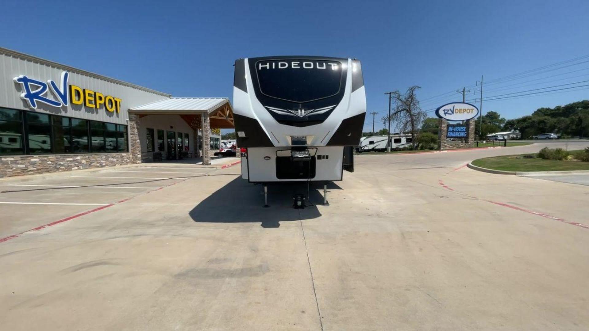 2021 KEYSTONE HIDEOUT 301DBS (4YDF30120M1) , Length: 34.17 ft. | Dry Weight: 8,669 lbs. | Gross Weight: 12,100 lbs. | Slides: 1 transmission, located at 4319 N Main St, Cleburne, TX, 76033, (817) 678-5133, 32.385960, -97.391212 - Photo#4