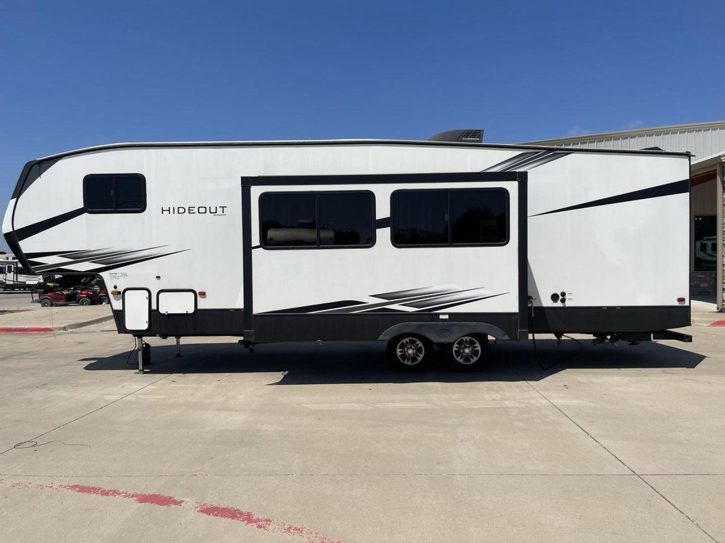 2021 KEYSTONE HIDEOUT 301DBS (4YDF30120M1) , Length: 34.17 ft. | Dry Weight: 8,669 lbs. | Gross Weight: 12,100 lbs. | Slides: 1 transmission, located at 4319 N Main St, Cleburne, TX, 76033, (817) 678-5133, 32.385960, -97.391212 - Photo#23