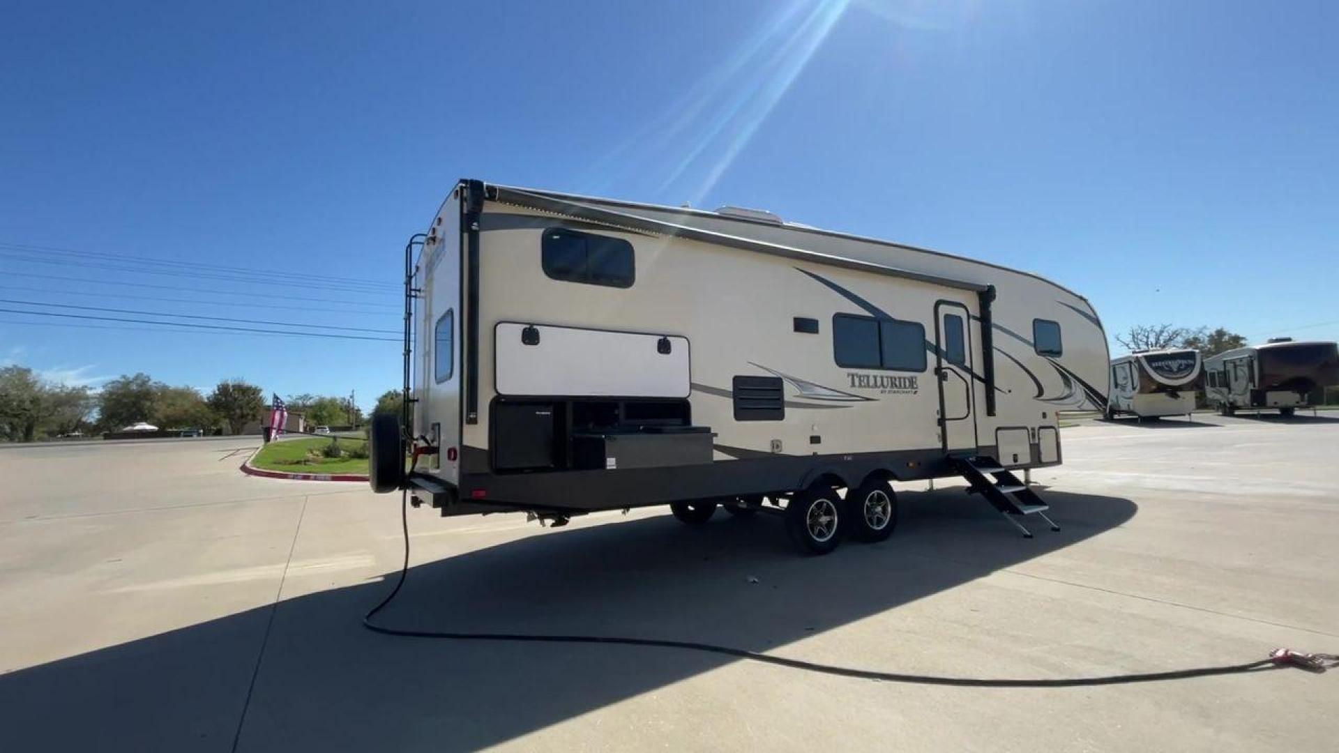 2021 STARCRAFT TELLURIDE 297BHS (1SACS0BS6M3) , Slides: 2 transmission, located at 4319 N Main St, Cleburne, TX, 76033, (817) 678-5133, 32.385960, -97.391212 - Discover the ultimate blend of luxury and adaptability with the 2021 Starcraft Telluride 297BHS. This fifth wheel comes with two slideouts and a spacious 21-foot power awning, providing plenty of room for outdoor relaxation and entertainment. Designed to comfortably accommodate up to 10 people, this - Photo#1